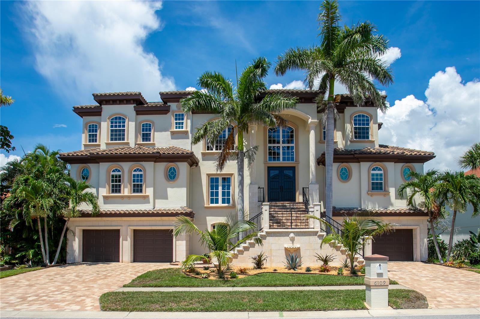 One or more photo(s) has been virtually staged. NOW THIS IS A STUNNING CUSTOM-BUILT WATERFRONT HOME and sits high and dry. This home is almost 6000 square feet heated and 11000 in total under roof. Boasting 6 bedrooms, a game room/bonus room, elevator, state of the art chef's kitchen with designer appliances office, 7 CAR GARAGE and 91 feet of protected water overlooking the Pasadena Yacht and Country Club Golf Course. This block home is a must see with newer windows and roof. 
  Located inside the GATED community offers a lifestyle rarely found in Pinellas County complete with a protected deep-water marina with easy access to Gulf, award winning 18-hole golf course, tennis courts, pickle ball courts, club house, restaurants and community pool. Purchase a property within the gates and jump the multiple year waitlist to become a member of this incredible Golf and Yachting community.