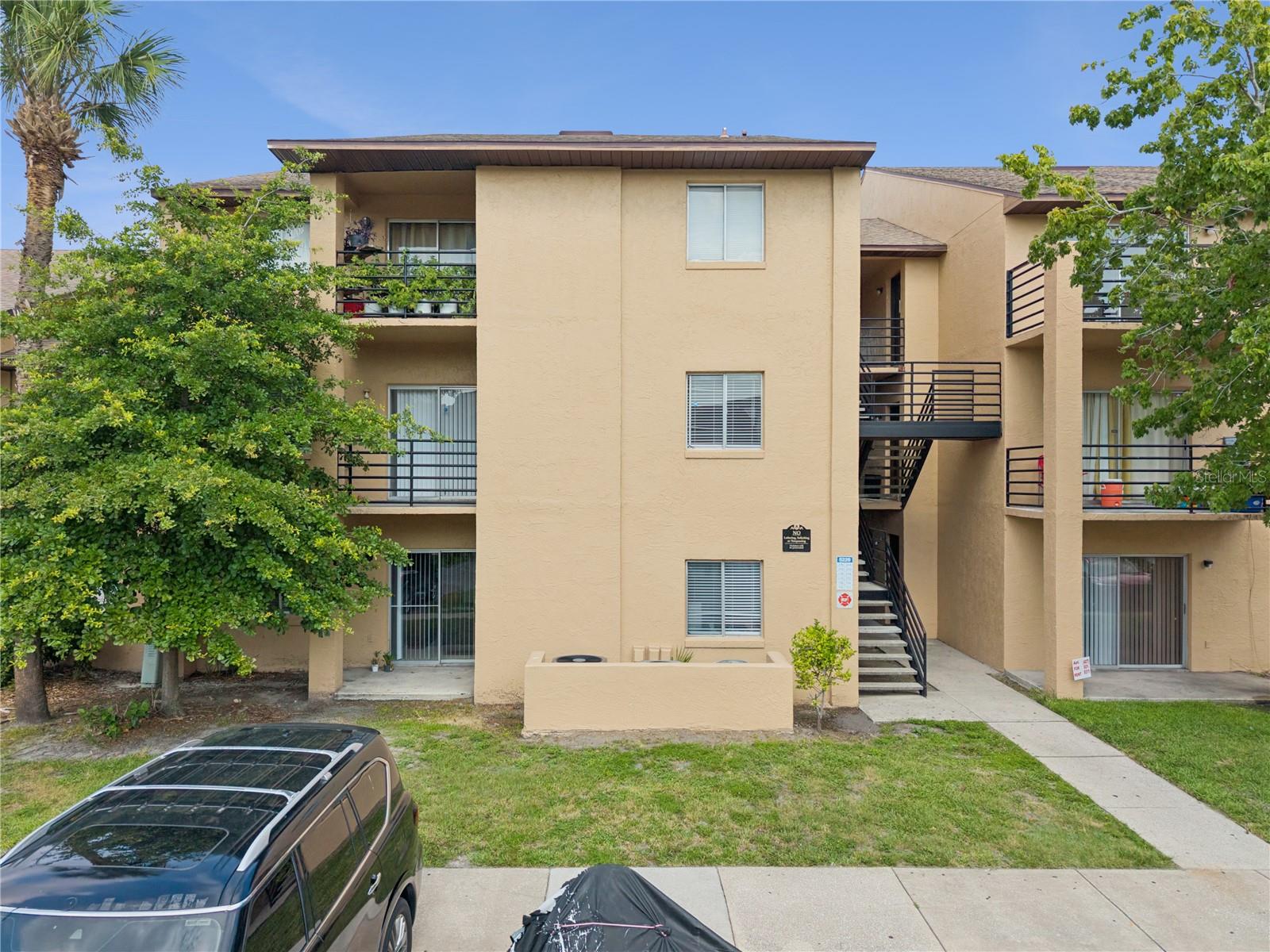 This move-in-ready Walk Up 1st Floor Condo offers a spacious 2-bedroom, 2-bathroom offering 1,073 sq.ft. of comfortable freshly painted living, features newer appliances, new ceiling fans throughout, HVAC was replaced in 2021  this unit features an open-concept layout with a bright living room, a private balcony, and a dedicated dining area—perfect for entertaining or relaxing at home. The kitchen comes equipped with ample cabinetry and a breakfast bar, while the primary suite offers a walk-in closet and an en-suite bathroom. The secondary bedroom is generously sized and ideal for guests or a home office.  Come see it today!