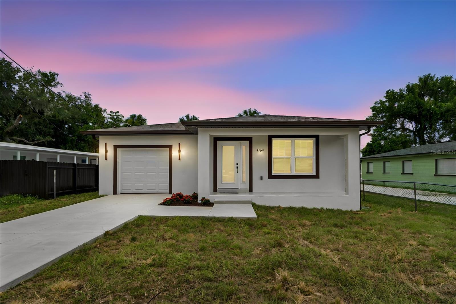 NEW CONSTRUCTION! Experience quality craftsmanship and modern design in this brand-new 3-bedroom, 2-bath home, and a convenient one-car attached garage. This thoughtfully designed home features an open-concept layout with abundant natural light, high ceilings, and premium finishes throughout. The spacious kitchen features a breakfast bar with eating space, stainless steel appliances, stone countertops, and sleek cabinetry for a modern, clean look, and seamlessly flowing into the living and dining areas—ideal for both everyday living and entertaining. The master suite provides a private retreat with an ensuite bathroom while additional bedrooms give flexibility for family, guests, or a home office. Built with efficiency and durability,  this new construction home delivers peace of mind with all-new systems, roof, new electrical system, new plumbing, new HVAC, and structure. For added peace of mind, impact-resistant windows and doors for enhanced storm protection and energy savings.Enjoy Florida living year-round, a fully fenced backyard, fresh sod, and a spacious concrete driveway. Whether you're hosting weekend barbecues, enjoying your morning coffee, or simply relaxing outdoors, this home was designed to make every day feel a little more special. Conveniently located near Bush Gardens, Ybor City, major highways, dining, and entertainment, this property is perfect for homeowners seeking style, comfort, and accessibility. Don’t miss the opportunity to own a move-in ready, newly built home in one of Tampa’s rapidly growing areas.