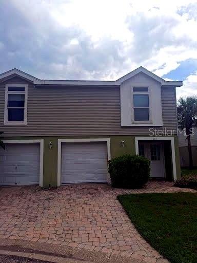 This attractive end-unit townhome in Marina Palms features 3 bedrooms, 2 bathrooms, and a 2-car garage that can hold up to four cars tandemly or be used for significant storage, including for a boat. The main bedroom includes a walk-in closet, access to a private balcony, and a full en suite with a step-in shower. Two other bedrooms share another full bath. The living room boasts a 9-ft tray ceiling, transom windows, and balcony access. The large kitchen is equipped with a side-by-side fridge with water and ice, a built-in microwave, and a glass-top stove. Marina Palms offers amenities such as a pool, hot tub, and maintenance services covering landscaping, pest control, garbage, and exterior cleaning. Don\'t miss out on this opportunity to own a stunning home in a great location-schedule your private tour today!