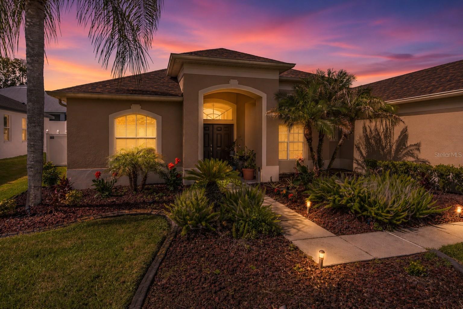 4BR/3BA pool home in Arista, Valrico. Triple-split floor plan, gated community, saltwater pool, no CDD. Roof 2025, HVAC 2025, Flood Zone X.  
This 4-bedroom, 3-bathroom pool home in the gated Arista community offers 2,585 heated square feet, a flexible triple-split floor plan, and major recent updates that help reduce future maintenance concerns. Built in 2006 and situated on a 10,240-square-foot cul-de-sac lot, the property benefits from no CDD fees, an HOA of just $850 annually, and Flood Zone X designation.  Inside, hardwood flooring, 12-foot ceilings, crown molding, recessed lighting, and abundant natural light create a welcoming atmosphere. The layout includes formal living and dining rooms, highlighted by a tray ceiling in the dining room, along with a spacious family room that opens to the outdoor living area. The kitchen is designed for both everyday living and entertaining, featuring 42-inch cherry cabinetry with crown molding and upper cabinet lighting, granite countertops, stainless steel appliances, a 5-burner gas cooktop, convection oven, multiple pantries, and a large breakfast bar overlooking the family room.  The primary suite offers direct access to the lanai and pool area, a double tray ceiling, dual walk-in closets with custom organizers, and a spacious en-suite bath with dual vanities, a soaking tub, separate shower, and private water closet. Two secondary bedrooms share a full guest bath, while the fourth bedroom is privately positioned off the family room with its own full bathroom, providing flexibility for guests, multigenerational living, or a dedicated office space.  Recent improvements include a new roof installed in April 2025 and a new HVAC system installed in June 2025. Additional features include an inside laundry room, cherry cabinetry in all bathrooms, seamless gutters with leaf guards, reclaimed water irrigation, extensive storage, and a 2-car garage.  Outdoor living centers around the saltwater pool installed in 2015, complemented by a screened enclosure, paver deck, tropical landscaping, landscape lighting, custom curbing, and a fully fenced backyard. The large covered lanai provides additional spa