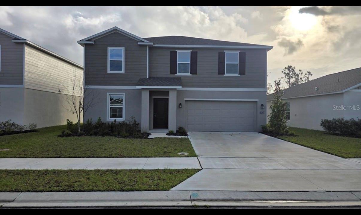 Welcome to 1326 Belle Isle Lane in the desirable LPGA community of Daytona Beach! This brand new beautifully maintained home offers a spacious open floor plan with modern finishes, abundant natural light, and a well-appointed kitchen featuring stainless steel appliances, ample cabinetry, and a large island perfect for entertaining. The generous primary suite includes a walk-in closet and private en-suite bath. Enjoy relaxing on the covered lanai overlooking the backyard. Conveniently located near shopping, dining, I-95, Tanger Outlets, Daytona International Speedway, and just a short drive to the beach. Lawn maintenance may be included (if applicable). Don't miss this opportunity to enjoy comfortable Florida living in a fantastic location!