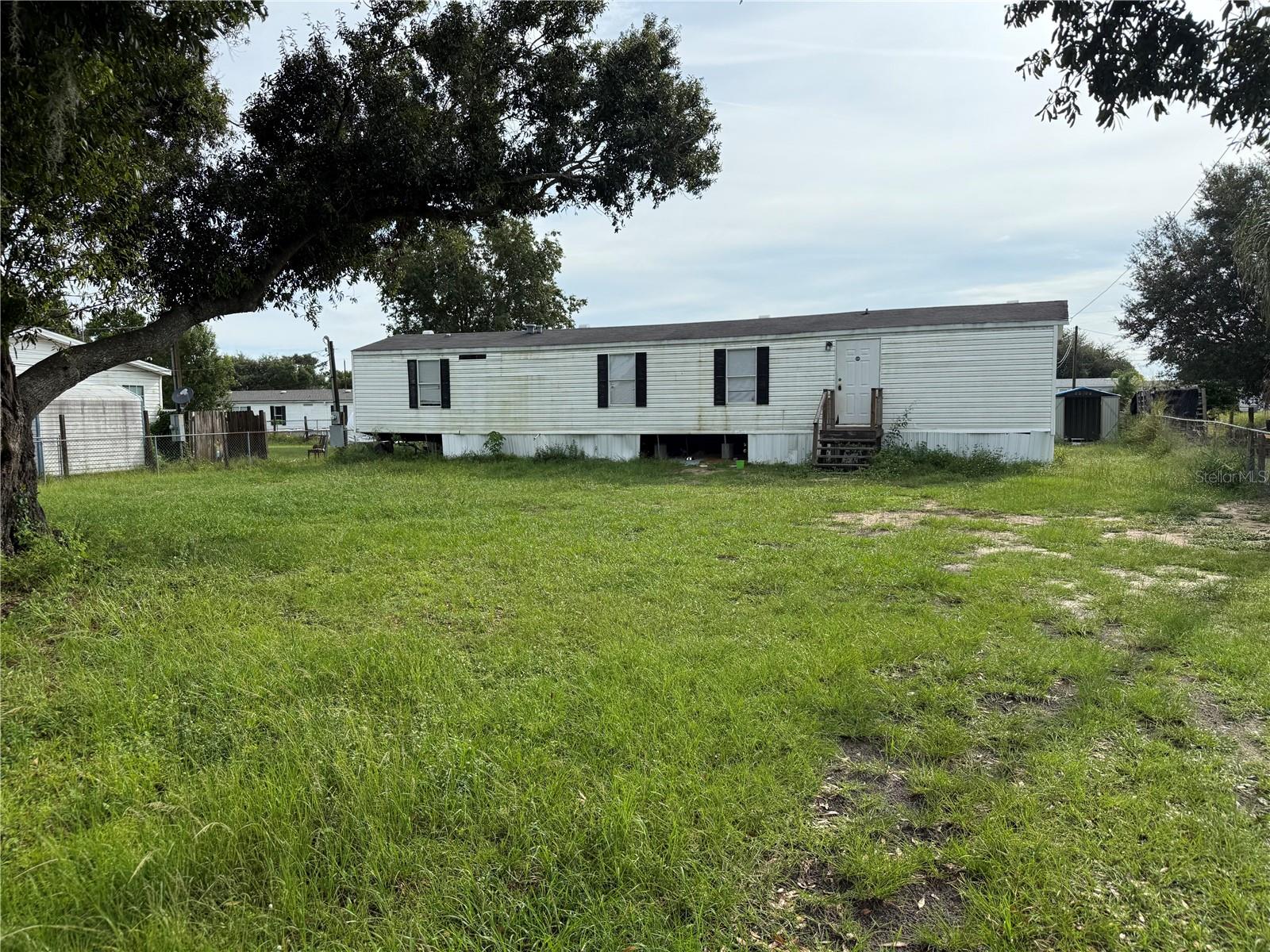 Investor Special! This 2-bedroom, 2-bath home is full of potential. With a little cleanup, you can enjoy the comfort of your own space or turn it into a great rental income property. The yard is fully fenced, providing plenty of room for family gatherings, parties, or storing your outdoor recreational equipment. Don’t miss out on this opportunity—schedule your showing today!