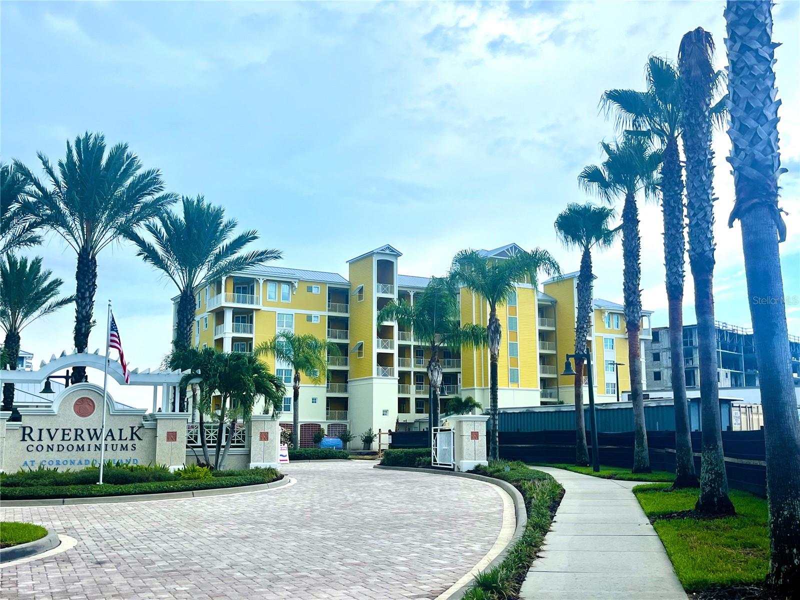 New Construction 3 bedroom/2 bath END UNIT in the heart of New Smyrna Beach.  Located in the highly desirable gated community of Riverwalk, this open floorplan end unit is awash with an abundance of natural light and has all of the upgrades you'd expect to find in an upscale property including quartz countertops, custom cabinets with soft close feature and under counter lighting, stainless steel GE appliances, 9 ft. ceilings, 5 1/2" baseboards, porcelain tile flooring, solid stone windowsills and many more upgrades too numerous to mention! 2 Balconies to enjoy both sunrises and sunsets!!!  Walk, bike or take your golf cart to the beach or the many shops and restaurants of Flagler Ave. and Canal St.  Enjoy the beautifully furnished clubhouse with fitness room, theater, large gathering room with well furnished kitchen or take a dip in the waterside pool and spa!  This spectacular community offers bocce ball, shuffleboard, tennis/pickleball and outdoor grilling areas. Marina boat slips are available for purchase!  Stop by our decorated sales model for a tour.  Open 7 days a week from 9am-5pm.