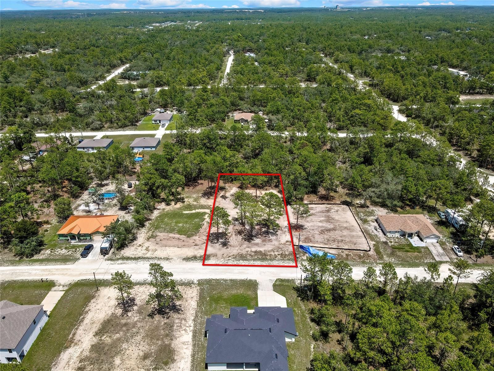 Buy Now, Build Later! Take advantage of this fantastic opportunity to own an oversized, nearly half-acre homesite in the highly desirable Royal Highlands community. Escape the hustle and bustle of the cities to the south while remaining just minutes from top-rated schools, shopping, restaurants, entertainment, and the beautiful Gulf of Mexico.
Enjoy Florida's natural beauty with nearby attractions such as Weeki Wachee Springs State Park and Pine Island Beach. Whether you're ready to build your dream home now or purchase and hold as a long-term investment, this property offers outstanding potential.

No HOA. No CDD fees. New homes are being built throughout this fast-growing community, making now the perfect time to secure your piece of Florida before values continue to rise.
This property is mostly cleared and nearly ready for construction, helping you get a head start on building your dream home. Even better, the adjacent lot is also available for sale by the same owner, presenting a rare opportunity to purchase two side-by-side lots. Whether you're looking for extra privacy, additional space for a larger estate, or a smart investment, this unique offering provides exceptional flexibility and value.