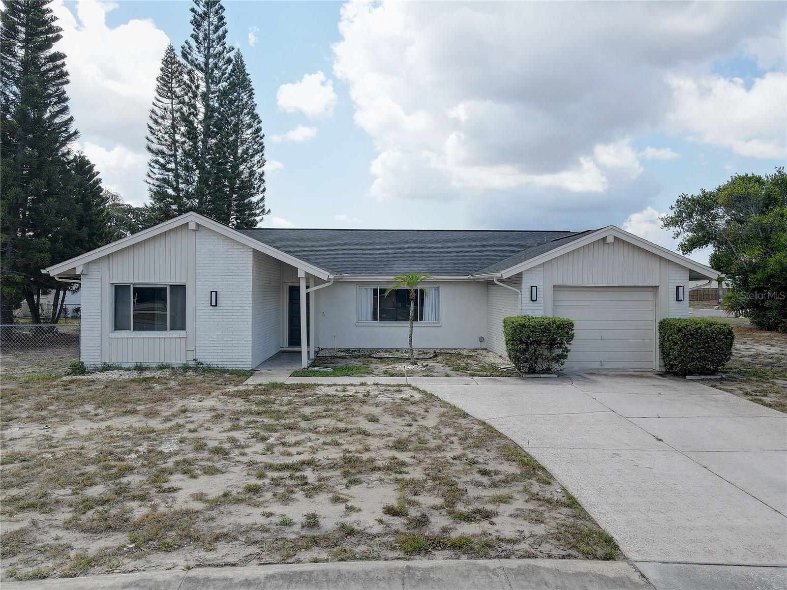 Welcome to 3718 Penrick Drive in Holiday, Florida — a beautifully updated home where all the major improvements have already been done for you! This move-in-ready property features a new roof, new HVAC system, new hot water heater, and a new reverse osmosis system for peace of mind. Inside, you’ll find a fully remodeled kitchen, updated bathroom vanities, and brand-new flooring throughout the entire home, creating a fresh, modern feel from top to bottom. With so many recent upgrades, this home offers both style and value — perfect for buyers looking for a turnkey opportunity.