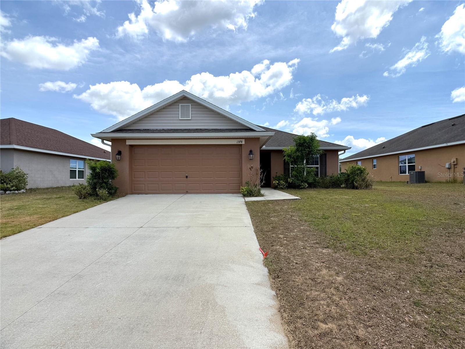 Lawn Care Included! Fresh Interior Paint Including the Garage! Brand-New Vinyl Flooring in the Living Areas and Bedrooms! New Washer and Dryer Included as Convenience Items! New Photos Coming Soon!
Move-in ready and perfectly priced, this beautiful 3-bedroom, 2-bathroom ranch-style home is located in the established Maria Vista community of Dundee. Featuring an open-concept floor plan with soaring ceilings, this home offers a bright, spacious atmosphere that is ideal for both everyday living and entertaining.
The well-appointed kitchen comes equipped with matching black appliances, including a French-door refrigerator, microwave, glass-top range, and dishwasher. A convenient pantry and breakfast bar overlook the living area, creating a seamless flow throughout the home.
The spacious primary suite provides a private retreat with dual-sink vanities and a relaxing garden tub/shower combination. The kitchen and bathrooms feature durable tile flooring, while the living areas and bedrooms showcase brand-new vinyl flooring for a modern look and easy maintenance.
Additional features include a two-car garage, an oversized driveway with ample parking, and a large backyard perfect for outdoor activities, entertaining guests, or simply enjoying the Florida sunshine.
Conveniently located just minutes from US Highway 27 and US Highway 17, Maria Vista offers easy access to shopping, dining, schools, and local attractions.
This home is ready for immediate occupancy and will not last long. Schedule your showing today! Sorry, no pets.