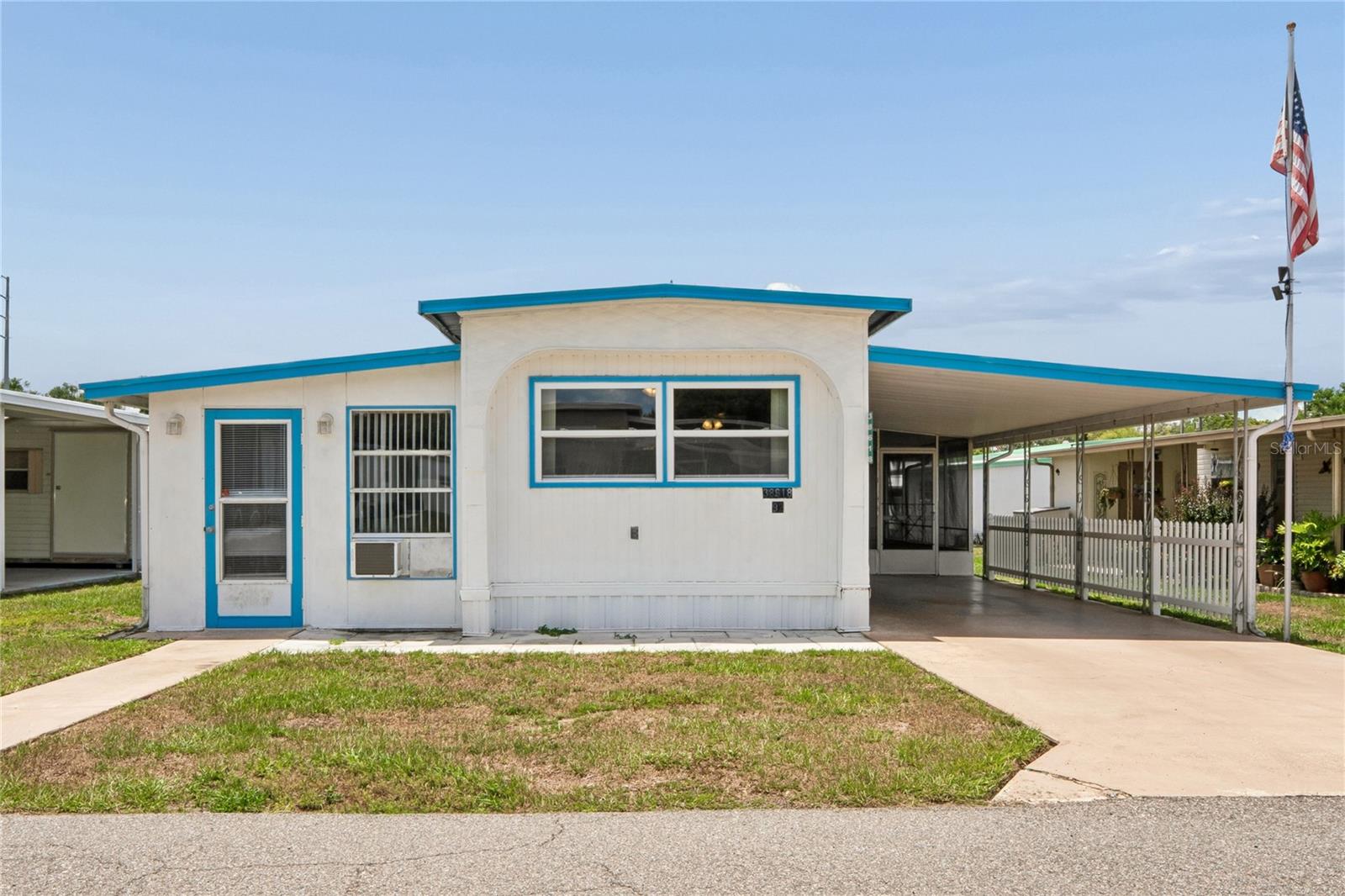 MOVE-IN READY!!  REDUCED TO $59,900! LOOKING FOR AN UPDATED STARTER HOME? Come and see this 2-bedroom, 1 bath home with completely remodeled kitchen and bathroom in 2023.  LOW MONTHLY HOA FEES only $120 a month for a POOL COMMUNITY!  This nicely updated singlewide home offers a cozy yet spacious layout with modern kitchen cabinets and new bathroom updated with easy get in shower.
The bonus room offers extra living space currently set up as a cozy living room with a couch that turns into a bed along with other furniture, that's an extra 240 sq. ft of living area as well as 684 Sq ft in the main area for a total of 924 sq ft of living area making use of all the space.  The spacious shed holds the washer & dryer and all of your extra things. Located in the 55+ Sleepy Hollow Community you will enjoy a sparkling pool, clubhouse, social activities or just relax.  You own the share (valued at $62,000) and the home (land & home) for $59,900. You are minutes from medical, dining, shopping facilities.  Call to view this home to see if it would work for you as a winter get-a-way or an all-year home where you feel safe, with a friendly community for only $120 a month for the HOA fee.  This comes with all the furniture and seller is motivated.