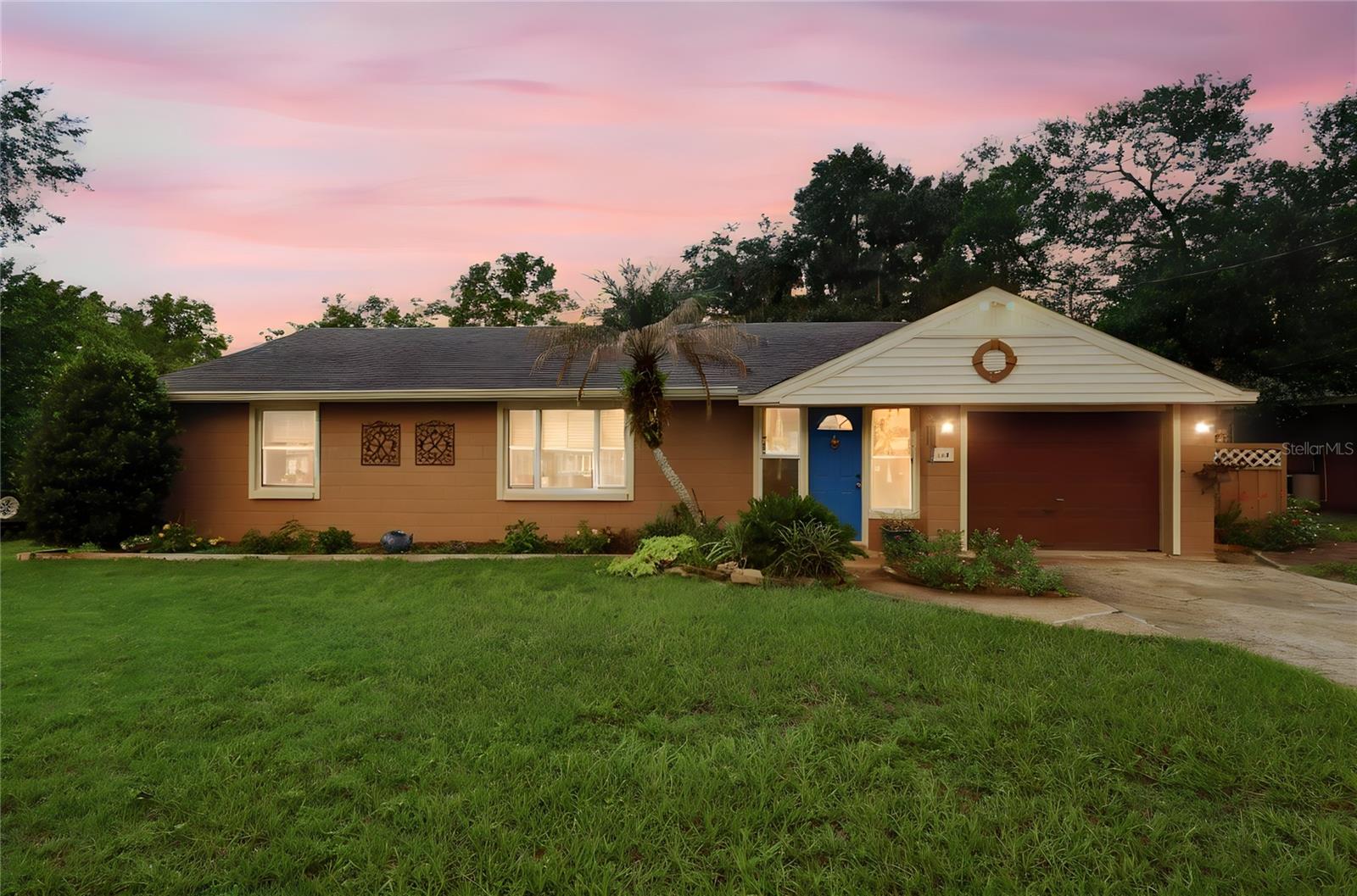 Lakefront Living at Its Finest – Welcome to 44 Bonita Road, DeBary!
Discover your own private retreat on the shores of Lake Bonita in this beautifully maintained 3-bedroom, 2-bathroom home offering over 1,800 square feet of living space. From the moment you arrive, you'll appreciate the peaceful setting, mature landscaping, and stunning waterfront views that make this property truly one of a kind.

Step inside to a spacious living room where panoramic views of Lake Bonita create a breathtaking backdrop for everyday living. Large windows fill the home with natural light, bringing the beauty of the outdoors inside and making the lake the focal point of the home.

The primary suite is a peaceful escape featuring its own private screened porch overlooking the water—perfect for enjoying your morning coffee while watching birds and local wildlife in their natural habitat.

Outside, the backyard is nothing short of a private oasis. Lush tropical vegetation surrounds an expansive patio complete with a fire pit, while a large deck overlooking the lake provides the perfect space for entertaining or simply relaxing. A charming gazebo at the water's edge offers a front-row seat to spectacular sunsets and the tranquil beauty of Lake Bonita.

Additional features include a one-car garage, a roof replaced in 2018, and a new water heater installed in 2026, providing added value and peace of mind for the next owner.

Whether you're entertaining guests, enjoying quiet evenings by the fire, or taking in the serene waterfront scenery, this home offers the perfect blend of comfort, nature, and Florida lakefront living. Conveniently located near shopping, dining, parks, SunRail, and I-4, you'll enjoy the tranquility of waterfront living while remaining close to everything Central Florida has to offer.