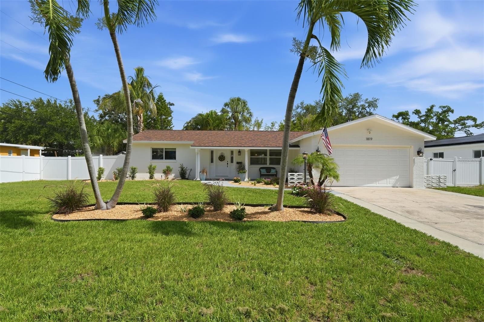 Completely renovated from the studs up, this exceptional home sits on a double lot, and offers the perfect blend of modern design, quality craftsmanship, and peace of mind. Every major system has been replaced, including all-new framing, plumbing, electrical, and a brand-new tankless water heater, creating a truly move-in-ready home.

The thoughtfully redesigned open-concept floor plan includes an additional bedroom and centers around a stunning chef's kitchen featuring custom cabinetry, designer lighting, an oversized quartz island with ample seating, sleek quartz countertops, and brand-new GE stainless steel appliances—perfect for entertaining and everyday living.

Additional upgrades include a new roof (2020), new HVAC system (2020), brand-new irrigation, fresh front-yard sod, and a low-maintenance backyard complete with premium artificial turf, a fully fenced yard, Trex decking, and a heated spa—your own private outdoor retreat.

Ideally located just minutes from vibrant Downtown St. Petersburg, enjoy convenient access to award-winning restaurants, shopping, waterfront parks, the Recreation Center, and the new YMCA facility. This is a rare opportunity to own a beautifully reimagined home in one of St. Pete's most desirable locations.