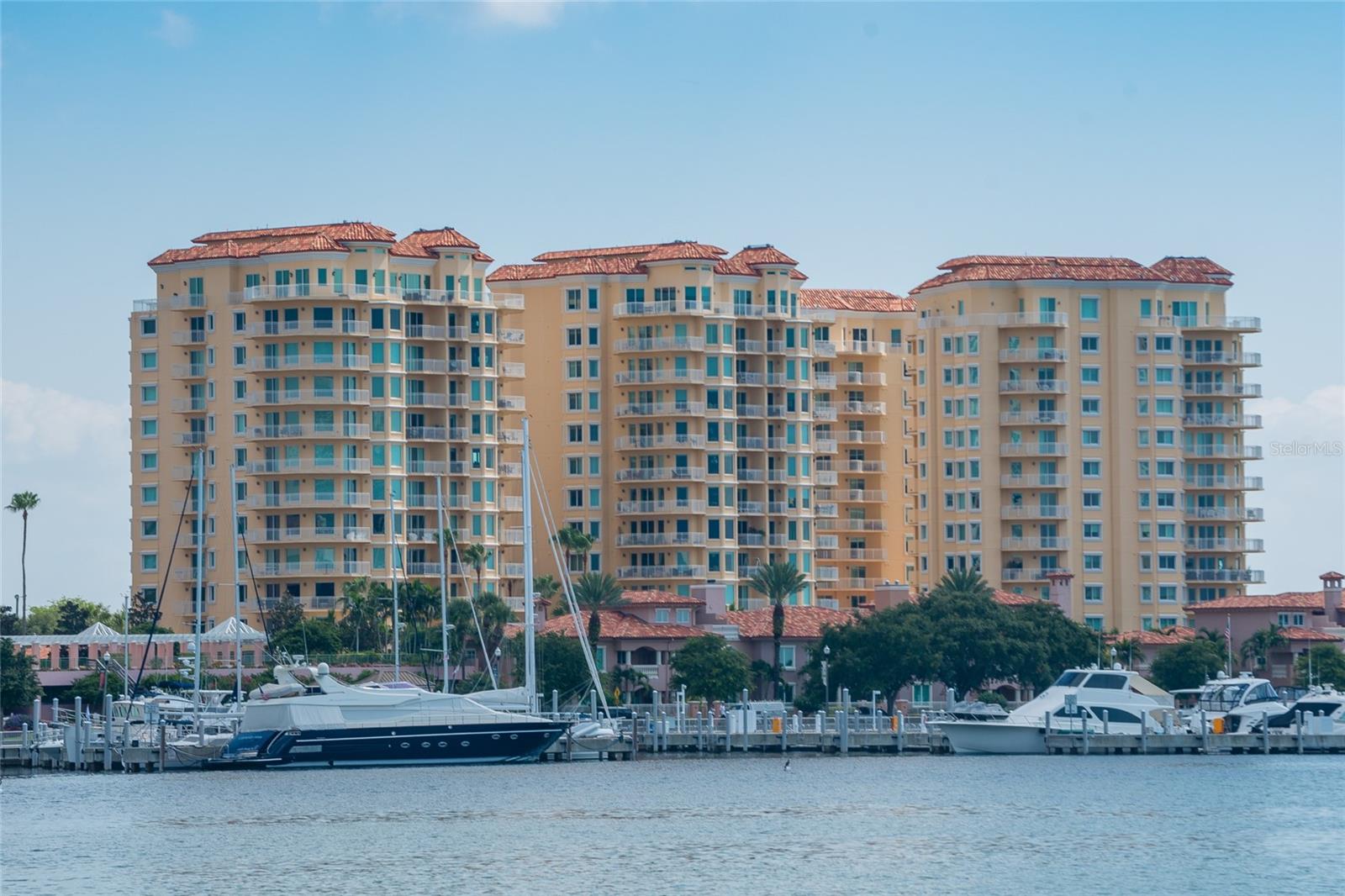 Commanding in scale and rich in potential, this expansive 3,300-square-foot waterfront residence offers a rare opportunity to own a truly grand condominium defined by volume, light, and breathtaking marina views. Thoughtfully positioned to embrace its setting, the home also includes two dedicated parking spaces, one equipped with a dedicated EV charging circuit and the other with a dedicated 20-amp circuit, providing modern convenience and future-forward functionality to complement the residence's impressive scale.

Designed for effortless living and entertaining, the home unfolds with generously proportioned living spaces that flow seamlessly toward the water. The kitchen opens directly into the main living area, allowing uninterrupted sightlines to the marina beyond-so whether you're preparing a morning coffee or hosting an evening gathering, the water remains a constant backdrop.

One of the home's most distinctive features is its four private balconies, each offering a unique vantage point to take in shimmering water views, passing boats, and ever-changing skies. These outdoor extensions create an indoor-outdoor rhythm rarely found in condominium living, ideal for sunrise moments, sunset cocktails, or quiet reflection.

The primary suite is truly oversized, functioning as a private retreat with ample room for a sitting area, workspace, or reading nook. With generous closets and direct access to outdoor space, it offers comfort, privacy, and flexibility-an exceptional foundation for a future spa-inspired sanctuary.

Throughout the residence, the emphasis is on scale, structure, and setting-a timeless architectural footprint that invites personalization. With remarkable square footage, stunning views, and a flowing layout, this home presents a blank canvas for a discerning buyer to tailor a bespoke waterfront residence to their vision.

This is not simply a condominium-it's a statement of space, light, and waterfront living, offering the rare chance to create something truly extraordinary in an irreplaceable setting.