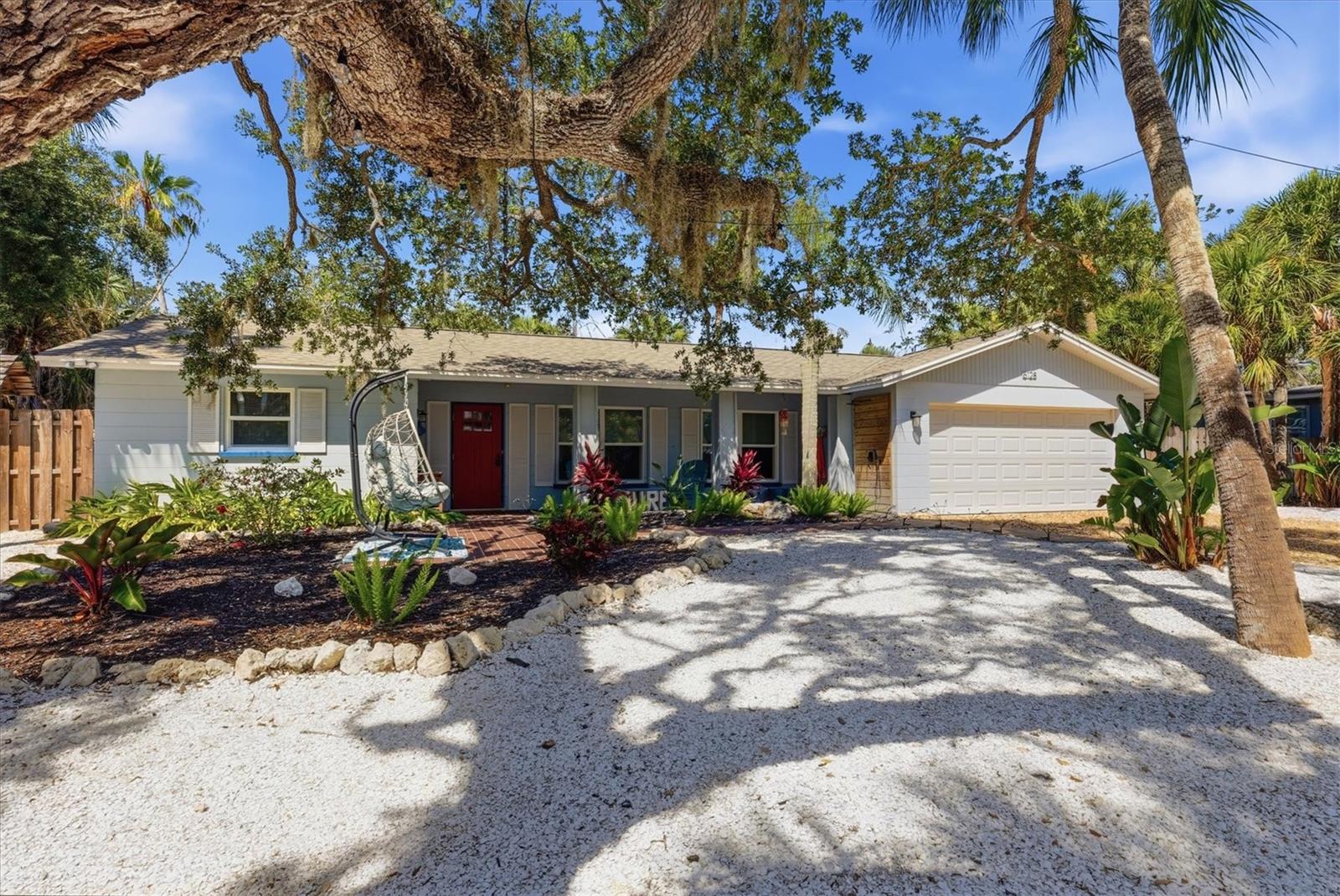 Nestled beneath majestic oak trees, this beautifully updated home offers a serene retreat just moments from Siesta Key Village and one of America's most celebrated beaches. Tastefully furnished and decorated, this residence underwent extensive renovations in recent years and features a newly installed roof, new impact rated windows, restored terrazzo flooring complemented by updated tile throughout. The kitchen is well-appointed with stainless steel appliances. Both bathrooms have been tastefully remodeled with granite countertops, updated fixtures, modern sinks, and designer finishes. 

Step outside to enjoy the enclosed, heated, chlorine-free pool and a private backyard oasis, perfect for relaxing or entertaining. 
Nearby, Siesta Key Village offers boutique shopping, acclaimed dining, live entertainment, vibrant nightlife, charming cafés, and peaceful parks. Aside from the stunning Siesta Key beaches... pickle ball, tennis courts and parks just a short bike ride away, provide fantastic outdoor recreation opportunities. Throughout the year, the island hosts a variety of special events that celebrate the unique lifestyle and beauty of the area. 

Experience the best of island living on world-famous Siesta Key, renowned for its powder-soft white sand, crystal-clear turquoise waters, and laid-back coastal charm. Whether you're seeking a full-time residence, vacation getaway, or income-producing investment, this exceptional property presents an opportunity to own your own slice of paradise. With strong year-round rental demand, it offers both an outstanding lifestyle and excellent investment potential.

All measurements are approximate and need to be confirmed by the buyer.