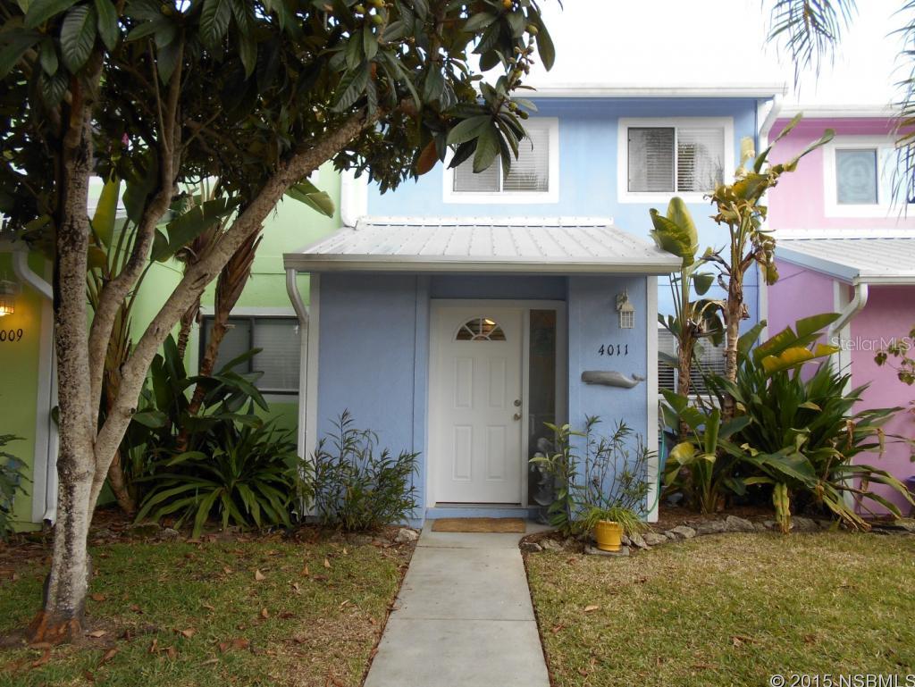Coconut Palms. Short walk to the Beach. Wonderful weekend retreat. Newer white cabinets, tile floors and newer carpet upstairs and in the bedrooms.  HOA covers common area, lawn, irrigation, trees, shrubs, parking lot and exterior. Beadboard ceilings downstairs and in the kitchen. This is a very cute beachy cottage in a fabulous neighborhood. Privacy fenced courtyard.Furniture negotiable. ;Water: City