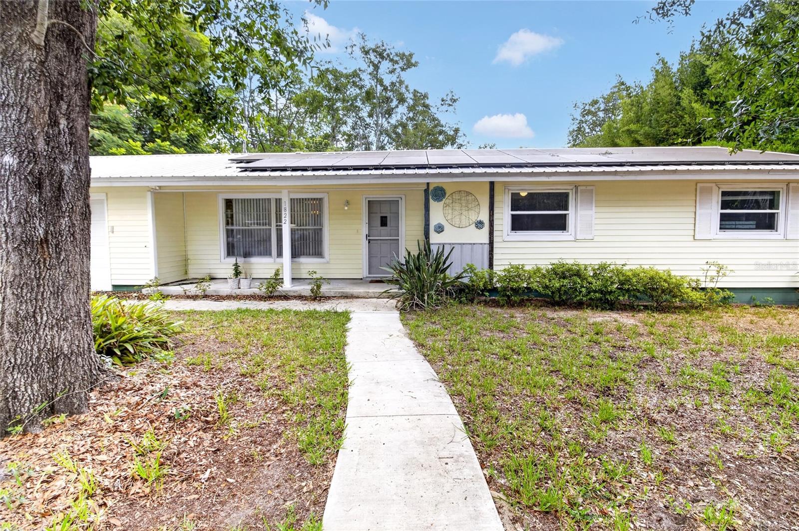 Virtually Staged. Welcome to Idylwild Serenola South, one of Southwest Gainesville's hidden gems! Nestled in a quiet, established neighborhood, this 3-bedroom, 2-bath home offers space, flexibility, and endless potential. In addition to the comfortable living areas, you'll find a versatile bonus/storage room perfect for a playroom, home office, hobby space, or extra storage, along with an oversized garage.

Dreaming of a home with space to create, build, and unwind? The oversized garage offers ample room for a workshop, hobbies, storage, or your next big project, while the long driveway provides plenty of parking for guests, boats, trailers, and recreational vehicles. Nestled within a peaceful, established neighborhood, this property offers the privacy and tranquility that make coming home the best part of your day.

Designed with outdoor living in mind, the property features a covered and screened back porch, a large screened lanai, and a sparkling pool that's ready for family gatherings, weekend cookouts, and relaxing Florida afternoons. The spacious backyard provides plenty of room for pets, gardening, play, or entertaining.

With no HOA, you'll enjoy added freedom and flexibility. Conveniently located near the University of Florida, UF Health, downtown Gainesville, Celebration Pointe, and the shopping, dining, and entertainment destinations that line Archer Road, this home combines a peaceful setting with easy access to everything Gainesville has to offer. Quick access to I-75 makes commuting throughout North Central Florida a breeze.

Bring your vision and personal touches to make this solid, well-loved home your own. Don't miss this opportunity to create something special in one of Gainesville's most desirable locations.