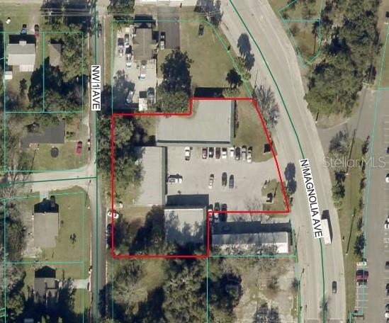 10,985± SF of flex retail/warehouse space offered across three buildings located on N Magnolia Ave in the heart of Ocala. This centrally located property provides quick and convenient access to US 441/301 and US 27, making it ideal for a wide range of commercial users seeking strong connectivity and visibility. Situated on approximately 0.95 acres and zoned B-4, the property allows for a broad mix of retail, service, and light industrial uses, offering excellent flexibility for both owner-users and investors.

The site is comprised of three separate buildings with a variety of unit sizes and configurations, each combining office and warehouse components. Building 100 totals 2,805± SF and features approximately 900± SF of office/showroom space with the balance dedicated to warehouse, serviced by a grade-level roll-up door. Building 200 consists of 3,080± SF divided into three equal units, each with a small office, restroom, and primarily warehouse space, along with one grade-level roll-up door per unit. Building 300 spans 5,100± SF and includes one 3,000± SF unit and two 1,050± SF units, all with roll-up doors and varying office/bathroom layouts.

The property can be acquired with a level of vacancy, allowing an owner-user the opportunity to occupy a portion of the space while benefiting from in-place income from existing tenants. Alternatively, investors can capitalize on the remaining vacancy to lease up the property and create additional value through stabilization. This multi-tenant flex asset presents a unique opportunity for both immediate functionality and long-term upside in a highly accessible Ocala corridor.
