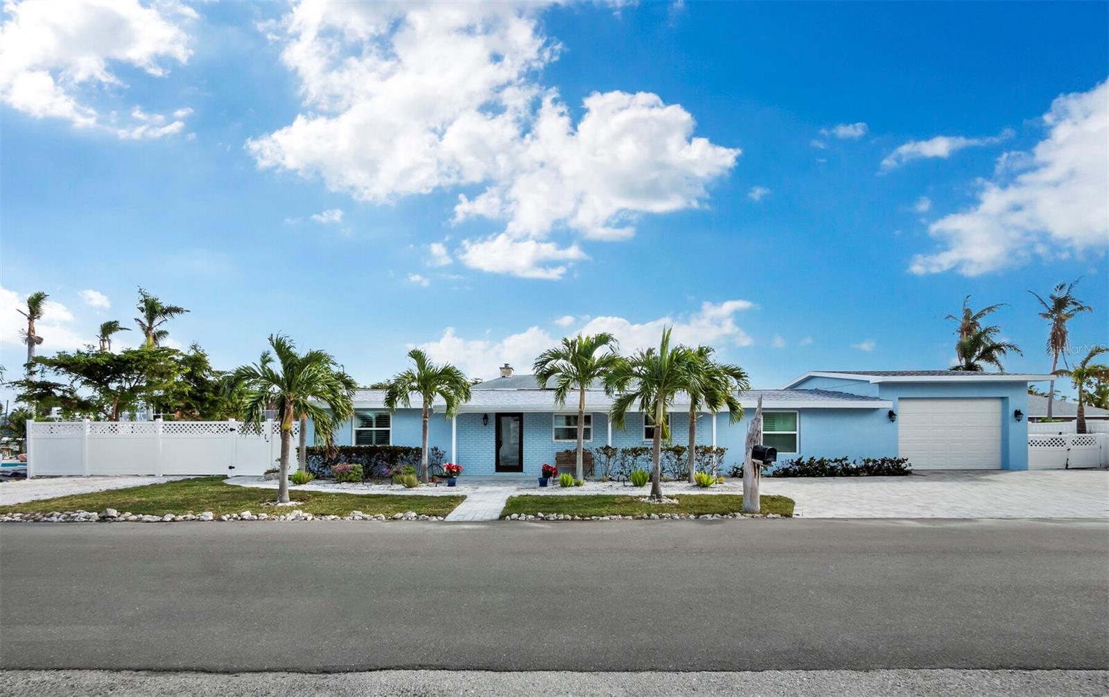 Laid-back Living on Longboat Key -- A Boater's Paradise!  Welcome to 744 Jungle Queen Way, a fully renovated, FURNISHED 3-bedroom, 2-bathroom coastal retreat on the stunning Longboat Key!  Whether you're a boating enthusiast, a beachcomber, or someone who just loves the island life, this home delivers the ultimate Florida lifestyle. ***Prime Location & Waterfront Living Nestled just seven homes away from Sarasota Bay, this property is a boater's dream with two boat lifts, offering quick access to the Gulf of Mexico's crystal-clear waters.  Spend your days fishing, cruising, or island-hopping--all from your backyard!  ***Deeded Beach Access - Just 777 Steps to Paradise... take a short  stroll across Gulf of Mexico Drive and find yourself on the powdery sands of Longboat Key's legendary beaches.  Enjoy sun-soaked days, breathtaking sunsets, and gentle Gulf breezes right outside your door.  ***Close to Local Favorites & Hidden Gems.  In just a short walk, you'll find island hotspots like the Lo'Key Island Grille, Guppy's Restaurant, and the award-winning Euphemia Haye.  A short boat ride, you can enjoy The Shore, Cortez Kitchen, Swordfish Grille, Tide Tables, Anna Maria Oyster Bar, Bridgetenders and Dockside restaurants.  ***Modern Updates with Coastal Charm.  Step inside to an open-concept layout featuring a spacious, upgraded kitchen with solid wood cabinetry and stone countertops -- perfect for entertaining.  The home's split-bedroom design ensures privacy, while the extra-wide lot provides a natural buffer between properties for peace and tranquility.  ***Take a short scenic 1-mile stroll from your front door to enjoy the beauty of Florida's coastal landscape at Joan M. Durante Park and the Sarasota Bay overlook dock for a peaceful escape.  This 32-acre bay front nature preserve features winding boardwalks, shaded trails, and scenic waterfront views, perfect for birdwatching, peaceful walks, or catching a sunrise over the mangroves.  ***Your Slice of Island Paradise Awaits!  Whether you're looking for a full-time residence, a vacation getaway, or an investment property, this home captures the essence of laid-back luxury.  Don't miss your chance to live the dream on Longboat Key!  ***Schedule your private showing today!