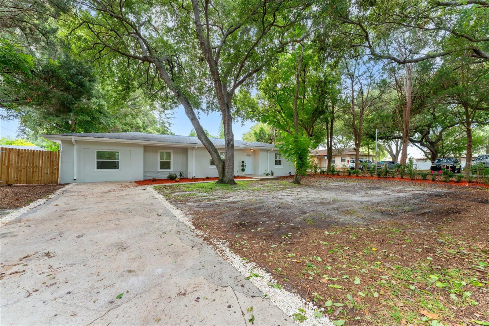 Virtually Staged. Discover the Florida lifestyle in this beautifully remodeled 4-bedroom, 2-bath pool home, ideally situated on a spacious lot in the heart of Largo, just minutes from Belleair Beach and the Gulf Coast’s stunning sandy shores. Thoughtfully updated throughout, this home features a stylish kitchen with quartz countertops, brand-new stainless-steel appliances, modern bathrooms, new wood laminate flooring, updated light fixtures, and fresh interior and exterior paint. The desirable split floor plan provides both privacy and functionality, while the open layout creates a bright, inviting atmosphere that’s perfect for everyday living and entertaining. Step outside to your private backyard retreat and enjoy the sparkling pool, ideal for relaxing and embracing Florida’s outdoor lifestyle.  Rear sheds offer additional storage or the perfect space, for a workshop. The property offers spacious front yard with possibility to park several cars, RV and a Boat. Major improvements include a brand-new AC system, water heater, and pool equipment. Conveniently located in walking distance to fine dining, shopping, bike to Belleair Beach, Indian Rocks Beach, and Clearwater beach. Beautiful Largo Central Park, Pinellas Trail, Largo City Hall are just minutes away from the house. This home offers exceptional flexibility with no HOA, no CDD fees, no flood zone, and lucrative long and short-term Airbnb rentals allowed. Whether you’re looking for a family home, vacation retreat, or investment property, this is a fantastic opportunity to own a slice of paradise on Florida’s Gulf Coast.