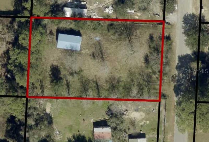 Investor Special! Excellent opportunity to acquire a residential lot in the rapidly growing Navarre area.***Property does have a storage shed***.  This property offers outstanding potential for investors, builders, or buyers looking to develop now or hold for future appreciation. Conveniently located near shopping, schools, dining, and the white-sand beaches of the Gulf Coast.


The parcel offers flexibility for residential development, with potential for site-built or manufactured housing subject to county verification and approval. With continued demand for affordable housing and strong growth throughout Santa Rosa County, this property presents an attractive opportunity for rental income, resale, or long-term investment.

Whether you're looking for your next build project, a manufactured home site, or a land investment in one of Northwest Florida's most desirable communities, this property deserves a closer look. Buyer to verify zoning, land use, utility availability, setbacks, flood zone, and all intended uses with Santa Rosa County.