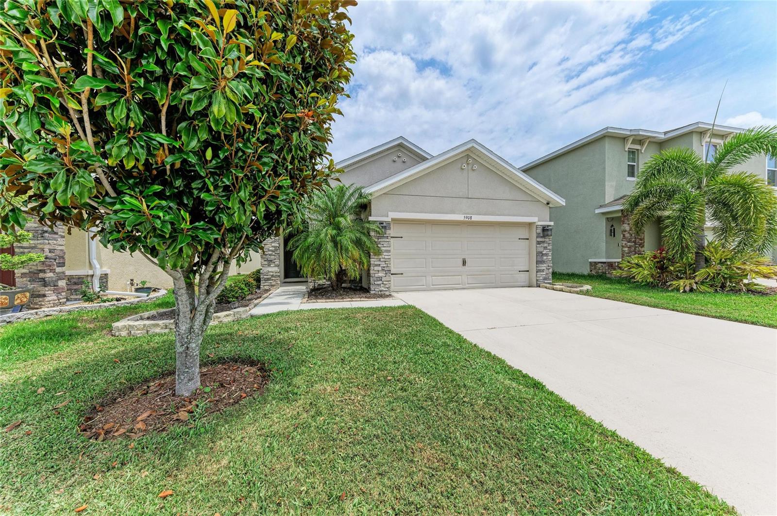 Welcome home! This beautifully updated 3-bedroom, 2-bath home with a 2-car garage checks all the boxes. It is located in one of the most affordable gated communities in the area. The main living area flows effortlessly from room to room, perfect for everyday living and entertaining. You will find thoughtful upgrades throughout including crown moulding in the common areas, electrical upgrades and fresh interior paint. The kitchen has been upgraded for you with granite countertops, all appliances and even a new kitchen sink. Step into the master suite with an ensuite bathroom with granite countertops, upgraded toilet and new shower enclosure.  The guest bathroom also features the same granite countertops, upgraded toilet and new shower enclosure as well.  Comfort is covered with a whole-home water softener, carpet lain over tile, that could easily be removed, for cozy underfoot warmth.  Continue through the home and step outside to your private backyard retreat featuring stunning paver and stonework — low maintenance with a drip irrigation system in the backyard keeping things lush without the work yet designed to impress. Located 2 mins away from I75 for easy commuting and 15 min to Siesta Key Beaches and 10 min from downtown, so conveniently located to everything!  This home is truly a move-in ready gem. Come see it before it's gone!