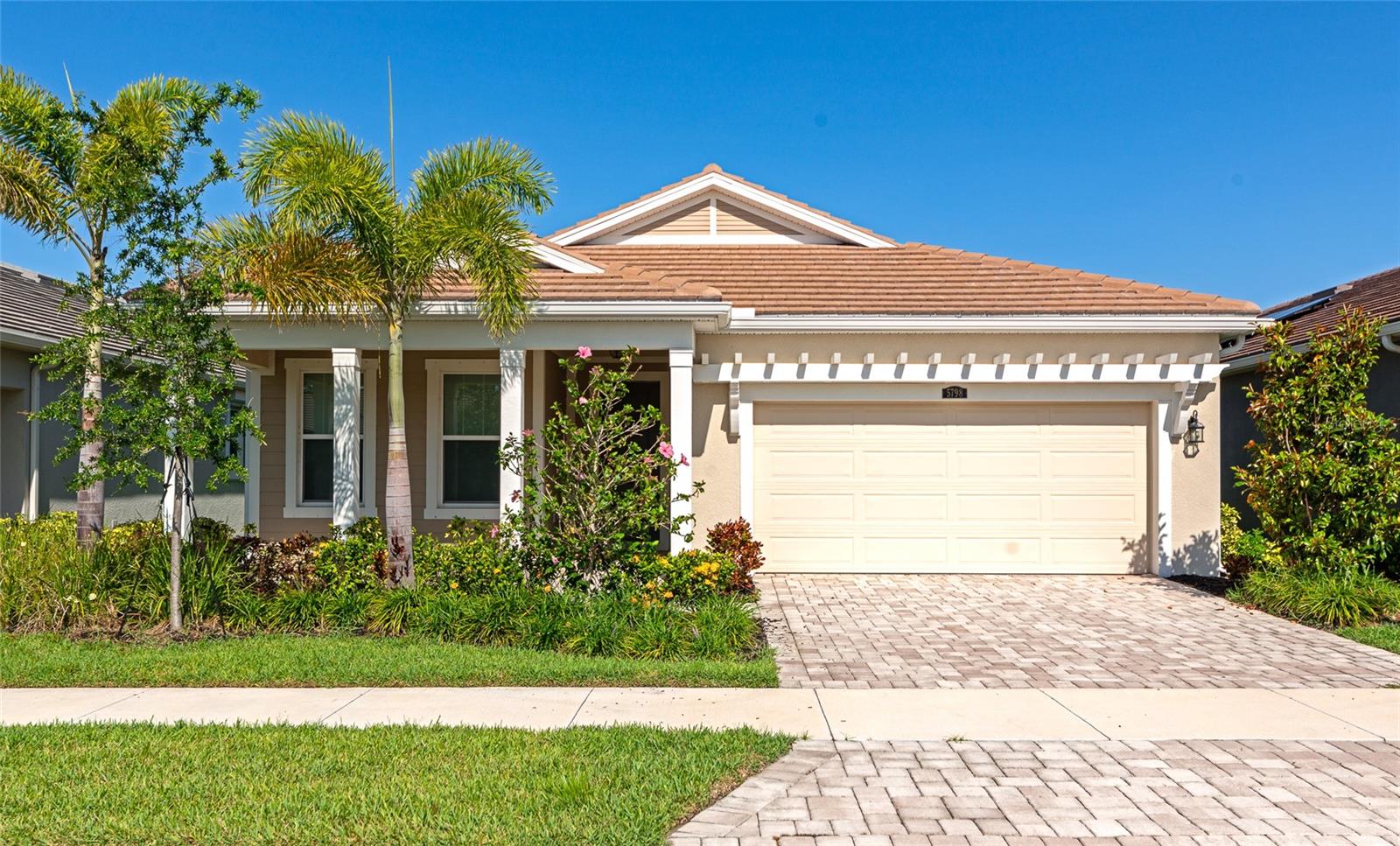 Modern Comfort & Style in Sunrise Preserve – 5798 Long Shore Loop, Sarasota, FL
Experience low-maintenance luxury living in this thoughtfully designed 2-bedroom, 2-bathroom home with a dedicated office/den, located in the highly sought-after gated community of Sunrise Preserve. Built in 2023, this home blends functionality with upscale finishes, making it perfect for everyday living and entertaining.

Step into a bright, open-concept layout featuring elegant tile flooring, tray ceilings, and high-end touches throughout. The chef’s kitchen is a standout, complete with a gas cooktop, stainless steel appliances, and a generous island that connects seamlessly to the living and dining areas.

The primary suite offers a relaxing retreat, featuring dual walk-in closets and a spa-like bathroom with double vanities and a glass-enclosed shower. The flexible office space is ideal for remote work or creative use.

Additional highlights include Gas water heater, an alarm system, and a 2-car garage.

Residents of Sunrise Preserve enjoy resort-style amenities, including a heated pool, clubhouse, fitness center, pickleball and tennis courts, and scenic walking trails. With low HOA fees, and a prime Sarasota location just minutes from Legacy Trail, shopping, dining, and top-rated schools, this home delivers comfort, convenience, and lifestyle.