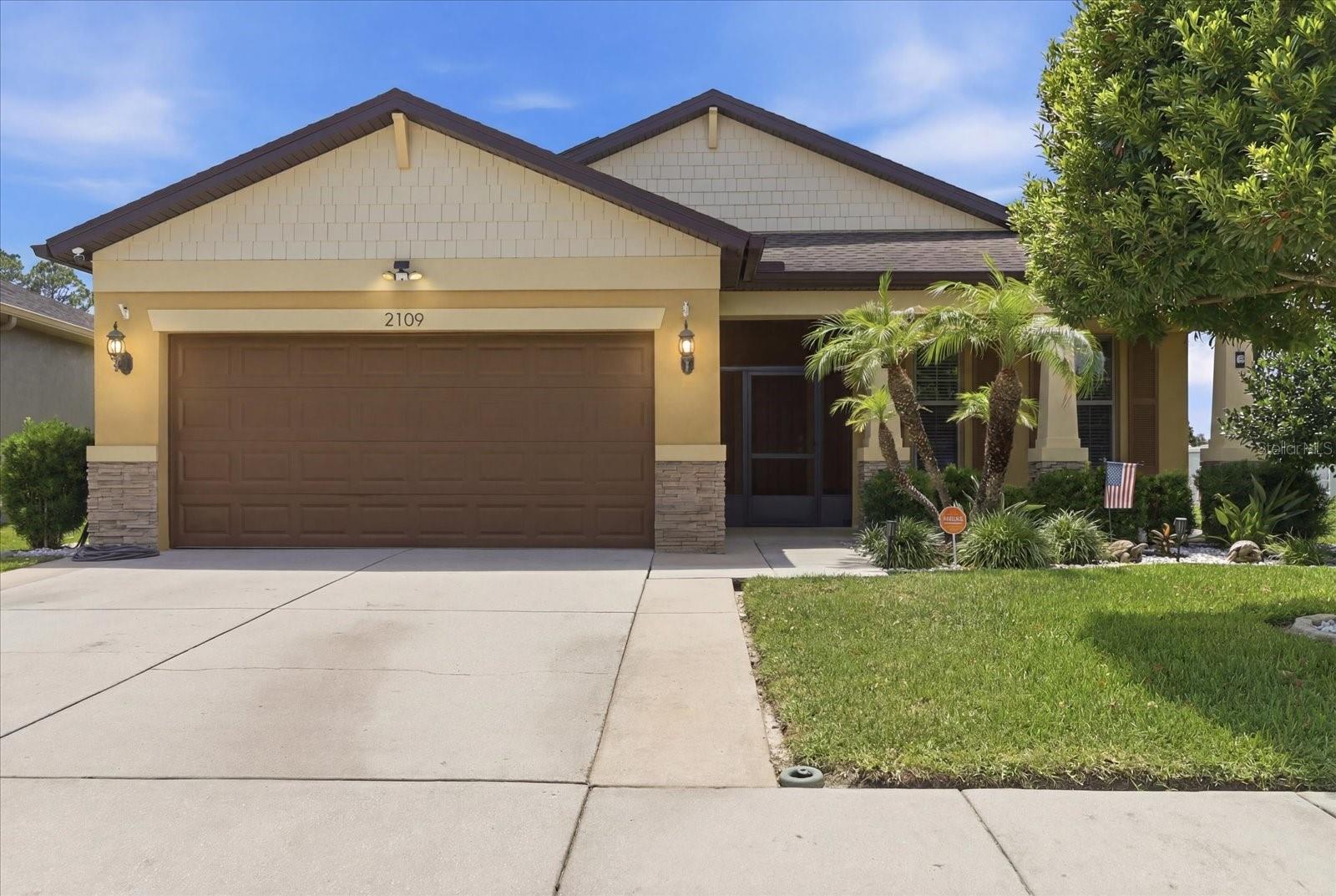 Welcome to this beautifully maintained 3-bedroom + flex room (potential 4th bedroom), 2-bath, 2-car garage home offering nearly 2,000 sq. ft. of living space in the heart of Brooksville. Featuring stone accents on the front exterior, a covered front porch, and excellent curb appeal, this home delivers a warm and inviting first impression.

Inside, the open floor plan creates a bright and functional layout ideal for both everyday living and entertaining. The kitchen is the heart of the home, featuring a large center island, stainless steel appliances, granite countertops, and a spacious closet pantry. The home is completely carpet-free with porcelain tile throughout the main living areas and wood flooring in the bedrooms.

The flexible front room offers versatility as a home office, playroom, or optional 4th bedroom. The spacious primary suite provides a relaxing retreat with an ensuite bath featuring dual sinks, granite countertops, and a massive walk-in closet.

Sliding doors off the main living area lead directly to the 12x25 screened lanai, complete with two ceiling fans and privacy blinds, perfect for indoor-outdoor living and entertaining. The backyard sits on a pie-shaped lot with conservation views and no rear neighbors, offering exceptional privacy and a peaceful natural setting.

The oversized 2-car garage includes a 4-foot extension, epoxy flooring, pull-down attic access, a dedicated storage room, and a solar attic fan. A widened driveway easily accommodates two full-size trucks.

This home is loaded with smart and energy-efficient upgrades, including a solar panel system with an ultra-low electric bill (approx. $30/month) and a Tesla solar battery backup system for power during outages. Additional features include a smart thermostat, whole-home security system with exterior cameras, doorbell camera, motion sensors, glass break detection, and smart controls. The HVAC system is enhanced with a UV light for improved air quality, and a reverse osmosis water filtration system adds everyday convenience.

Located in a desirable community with low HOA fees (including trash and recycling) and no CDD fees, residents enjoy access to a community pool, clubhouse, and playground. Conveniently located near the Suncoast Parkway and a short drive to Tampa International Airport, this home offers a desirable blend of comfort, privacy, and accessibility.