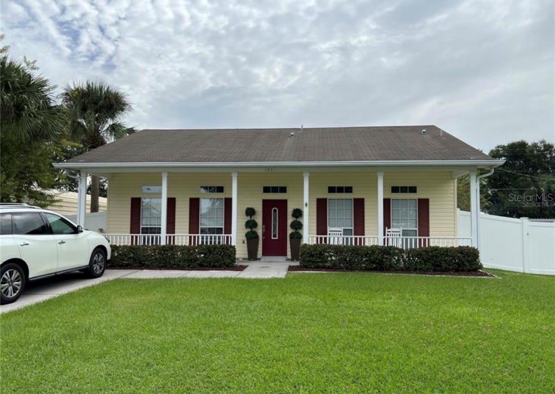 Modern Comfort at prime location. Built in 2003 3 Bedrooms 2  bathrooms. minutes away from Saint Cloud Lake Shore. Enjoy convenience Valencia College, Orlando Health and Advent Health medical, shopping, dining, entertainment and quick access to Turnpike. Live the ultimate Florida lifestyle. Step out your front door and enjoy the scenic walking trails, close to Chisholm parks and water views of Saint Cloud Lake Shore. Perfect for jogging, paddleboarding, or unwinding by the water during a sunrise or sunset. Located in a highly desirable, peaceful neighborhood.
Located in the Historic District of downtown St. Cloud. From the driveway see the wide front porch ready for rocking chairs, and enjoy watching the world go by. All the front windows have transom windows above, to really let the light in. The large living room is open to the dining room and kitchen, which has a high breakfast bar with seating, all newer appliances, and natural oak cabinetry. There is a closet pantry, and the kitchen exits to the 2-car garage at the back of the house, and also to the back yard. The back yard has a lovely sitting area with stone pavers underfoot, 6-ft vinyl privacy fencing, and a paved walkway leading around to the garage. Back inside, down the hallway is the owner's suite with walk-in closet and suite bath with ceramic-tile enclosed tub/shower. The remaining two bedrooms each have double closets, and share the second full bath. The home has attractive natural wood moldings and door frames. AC system was replaced in 2017, water heater is brand-new, flooring is laminate and ceramic tile, new Ceiling Fans, and much upgrades you will enjoy. Check out this great home, which is in a good central location. Schools, shopping, and hospitals are nearby. St. Cloud's lakefront is only 10 blocks away, with dining, marina, walking paths and playground/splash pad. Driving one hour east brings to you Cocoa Beach and the Atlantic Ocean, go west to Tampa/St. Pete. Orlando Int'l Airport is not far away. The nearby FL Turnpike brings you to Central Florida's theme parks. There a lot to do, starting from right here in St. Cloud, Florida!