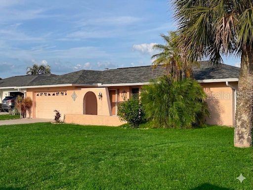 Lakeview Pool Home in Jacaranda West.
A spacious lakefront retreat offering flexible living spaces, serene water views, and a private pool — all in one of Venice’s most established and desirable communities. Located within Jacaranda West HOA Residence. Home offers 2 Bedrooms | 2 Bathrooms, plus den, 2-Car Garage.  Private screened pool overlooking the lake. Formal living room and dining room for entertaining. Separate den ideal for a home office or study or possible Bonus room perfect for a media room, or hobby space. Bright, open living areas with abundant natural light. Functional floor plan designed for comfort and flexibility. Kitchen & Dining feature a well-appointed kitchen with generous cabinetry and workspace. Dedicated areas for both formal and casual dining.  New roof and new paint inside and outside. Venice Gardens has an Optional homeowners' dues where you can enjoy access to free exercise classes, water aerobics, Tiki Night, and potluck events. Also available are discounted rates on monthly Craft fair tables, hall rentals and pool party picnics.