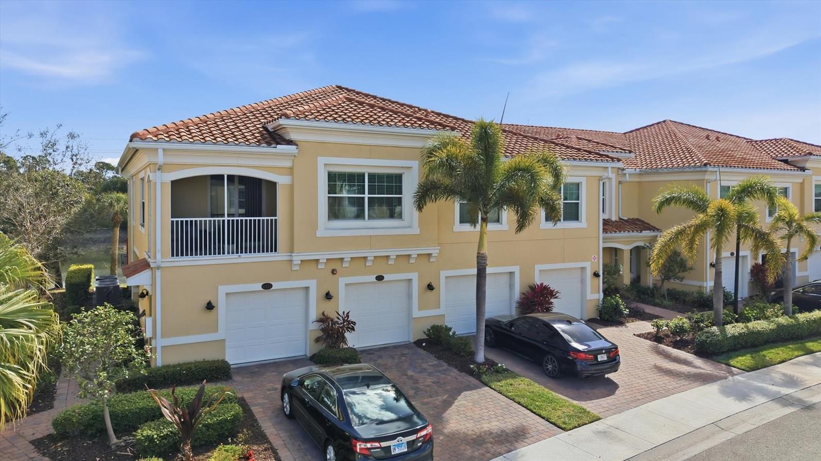 One or more photo(s) has been virtually staged. Spectacular water views from most windows in this immaculate, lightly used 3BR/2BA condo, built in 2018 and located in the gated community of Bay Street Villages. The popular Ibis floor plan offers an open-concept kitchen, dining, and great room with designer finishes, including white 42” cabinetry, light granite countertops, custom backsplash and stainless-steel appliances.
Enjoy peaceful pond views with birds and wildlife from the screened lanai. Quality construction and peace of mind are provided by hurricane-impact windows and doors, concrete block construction, tile roof, and a paver driveway.
The primary suite features plantation shutters, a custom ceiling fan with light, custom closet system, linen closet, lighted 10× makeup mirror, and a bidet-ready outlet. The second and third bedrooms also include custom ceiling fans and 2" blinds. The dining area is accented by a custom light fixture and accordion blinds on the balcony sliding doors.
The balcony is enhanced with a tropical palm-leaf ceiling fan and outdoor curtains for added shade and comfort. The great room is fitted with plantation shutters for added elegance. A spacious laundry room includes a washer and dryer.  Added features-Ring Doorbell, Keyless Entry on Front Door as well as an Exterior Garage door keypad.   
The monthly condo fee includes water, sewer, exterior and grounds maintenance, gated entry, heated resort-style pool, cabana, fitness center, and club room. No CDD fees.
Ideally located near Nokomis Beach, Casey Key, Siesta Key Beach, the Legacy Trail, Sarasota and Venice dining and shopping, Oscar Scherer Park, and A-rated Pine View School.
Maintenance-free Florida living at its best.