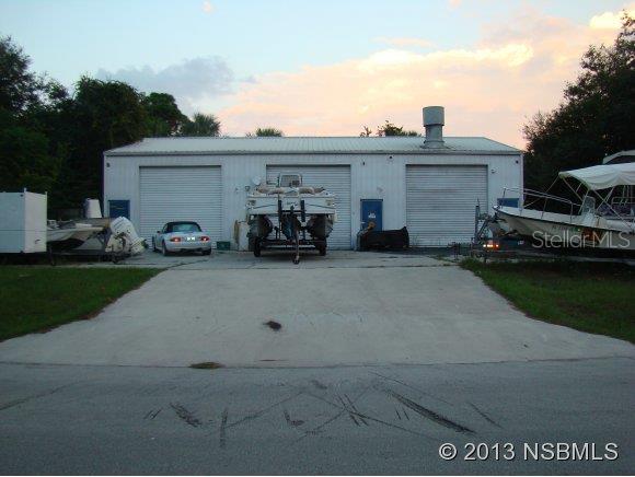 5 lots 200 x 125.Own your own body shop / fiberglass business grandfathered in. Extra insulated roof for cooler work area in the summer. OSHA approved Paint Booth 24 x 14 x 8 ft high. Auto/van lift, 80 Gal to 175 PSI compressor by Huffy and fans. 3 12 x 12 steel overhead doors. Bring your tools and start your own business. Owner will considering financing with reasonable terms. ;Water: City