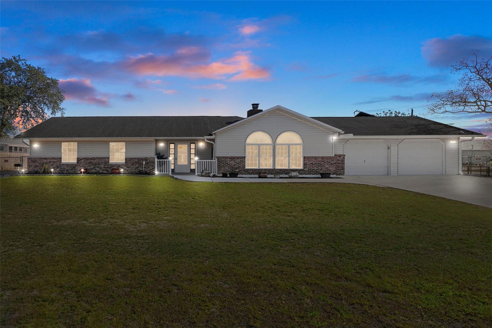Spacious 3-bedroom, 2.5-bath home offering 2,109 sq ft (2,976 total sq ft) with an oversized 2-car garage and a saltwater pool, situated on a large fully fenced corner lot in a great location close to all conveniences. This freshly painted home features an updated eat-in kitchen, stainless steel appliances, ample cabinetry, and a large pantry, along with a separate formal dining room and a family room with a wood-burning fireplace with electric insert. Additional highlights include a flex room -ideal for a living area, home office, or game room, smart thermostat, smart automated pool pump, 5-camera Arlo security system, new water softener with carbon filtration 2025, roof replaced in 2019, washer and dryer included, and easy show--call today to schedule your appointment!!!