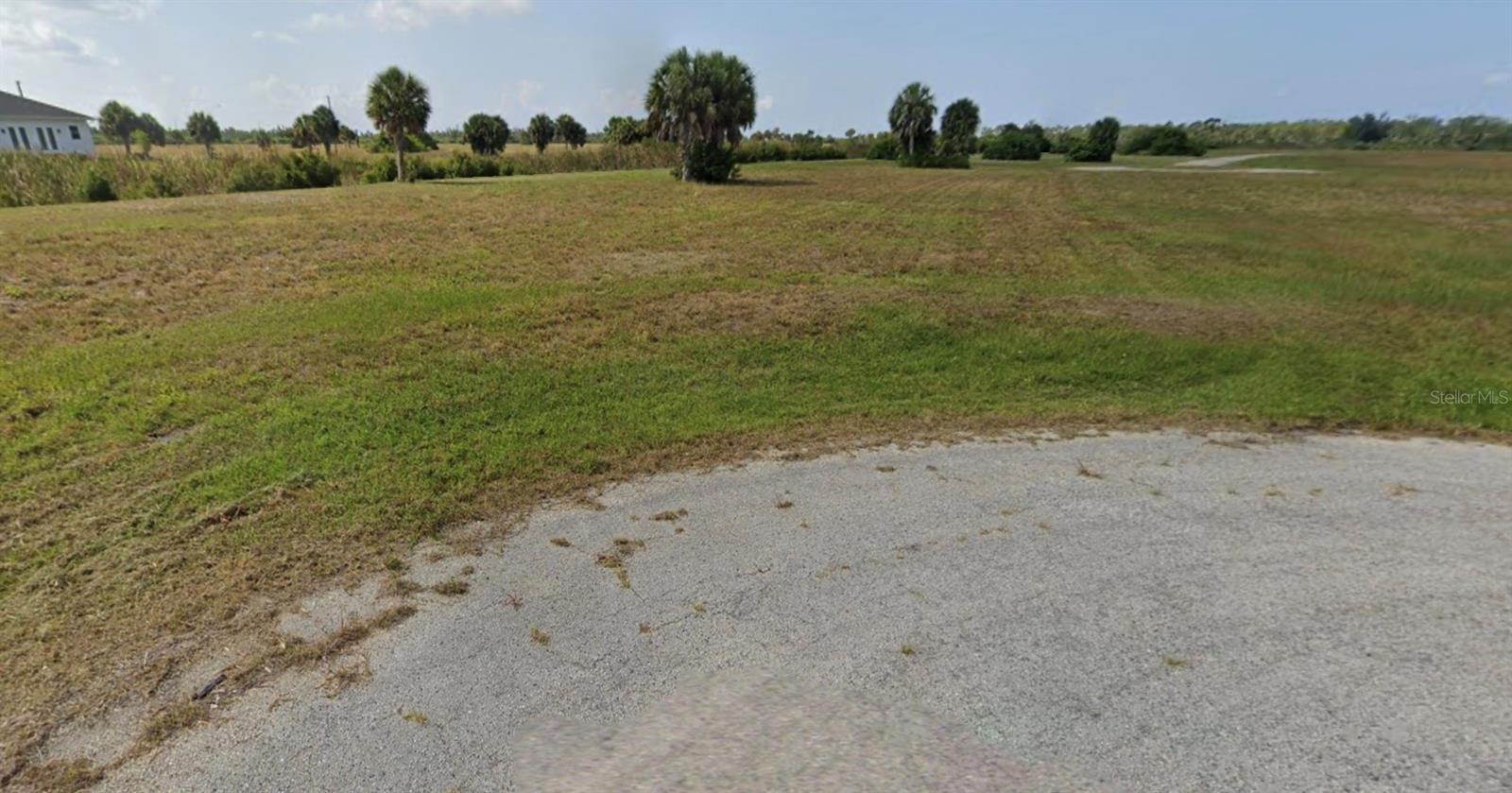 Welcome to your Southwest Florida living. Clear blank canvas bring your vision to this Waterfront vacant lot, cleared, close to some of the best beaches in SWFlorida and live entertainment, restaurants, golf, waterspouts and everything you need.