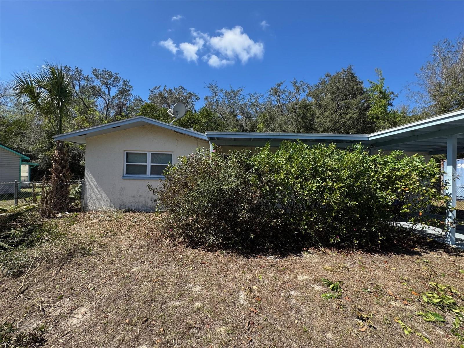 INVESTOR SPECIAL! Three bedroom, two bath home on a quiet street. Open kitchen with breakfast counter and adjacent dining area, living room looks out to the front yard. The split bedrooms each have access to the two full baths. This home is small in square footage but the layout is comfortable and flowing. The rear Florida Room has laundry closet and room for relaxing and enjoying the private backyard., open the windows and let the breeze in during pleasant weather or shut them to control the climate for your comfort. This home needs considerable updating and repairs including roof, hvac as well as appliances and cosmetic improvements.  Make this home beautiful your way!