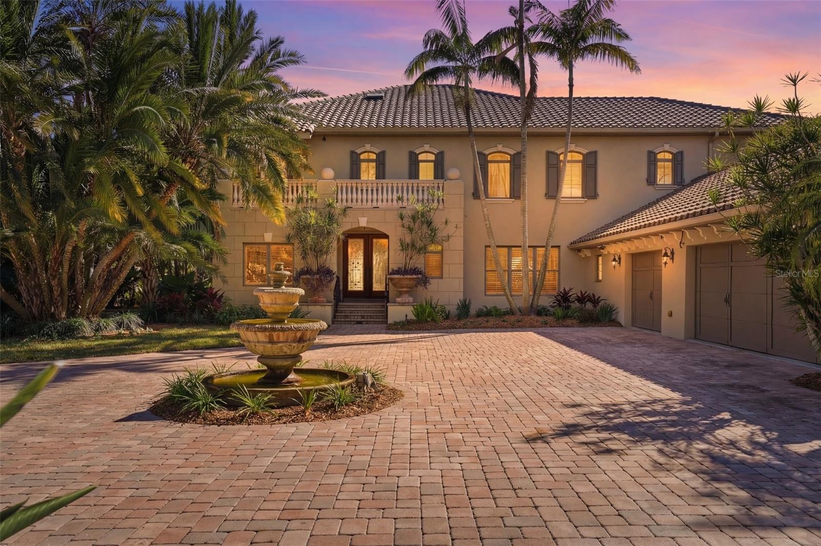 6755 30th St S is an extraordinarily rare offering: a true waterfront estate set directly on the open waters of Tampa Bay.
Spanning approximately 0.77 acres — an estate-caliber homesite rarely found in St. Petersburg — with over 166 feet of waterfront along the rear and additional exposure along the side, the property offers a scale, presence, and setting that few buyers will ever have the opportunity to acquire. Positioned at the end of a quiet street with water on two sides, it provides a level of privacy and separation that is exceptionally difficult to replicate, along with expansive views across Tampa Bay to the iconic Sunshine Skyway Bridge, a dynamic backdrop by day and brilliantly illuminated at night.
A circular driveway anchored by a central fountain creates a striking sense of arrival, a setting that feels as though it is waiting for a collection of exceptional automobiles. Mature palms and artfully layered landscaping reinforce the estate's presence from the moment you enter the property.
The residence encompasses over 5,800 square feet of living space, with five bedrooms, six baths, a dedicated 1st floor office, and a private elevator serving all levels — essential in a home of this scale. A complete gut renovation in 2003 filled the concrete block structure and fitted Pella Miami-Dade-rated windows and doors throughout — built like a fortress. Nearly every room is intentionally oriented toward the water, ensuring the home fully captures its exceptional setting.
The kitchen reflects custom craftsmanship and scale, anchored by a 48-inch Dacor range and complemented by a Sub-Zero 632 side-by-side refrigerator and freezer with icemaker, built-in microwave, and pot filler. The kitchen's dinette looks out over the grounds and directly into Tampa Bay — it is the kind of setting that makes every day feel exceptional.
Expansive openings throughout the home create a seamless connection between interior and exterior spaces, allowing gatherings to move effortlessly between the various gathering areas. 
Outdoor living unfolds across both upper and lower levels of the home. A large pool with spillover spa, outdoor kitchen, and multiple gathering areas create a natural extension of the interior spaces. Seating areas are thoughtfully positioned to take in the water, while the expansive lawn provides space for recreation, events, or additional outdoor living concepts.
From the private dock, Tampa Bay becomes an extension of the property. Boating, kayaking, and fishing are all directly accessible, with frequent sightings of dolphins, manatees, and a remarkable variety of coastal birdlife. Under the head of the dock are numerous reef balls creating a natural nursery for sea life of all kinds. The experience is both active and serene, a rare balance on open water.
What further distinguishes this property is its location along the southern edge of Pinellas County, offering a sense of separation and privacy rarely found at this level, while still providing direct access to I-275, downtown St. Petersburg, the Gulf beaches, and multiple airports. To create the ultimate private waterfront estate, the neighboring property at 6754 31st St S is also available, enabling the assembly of a waterfront compound with over 260 feet of direct Tampa Bay frontage.
This is more than a home. It is a setting for an elevated waterfront lifestyle, defined by scale, presence, and a direct connection to Tampa Bay.