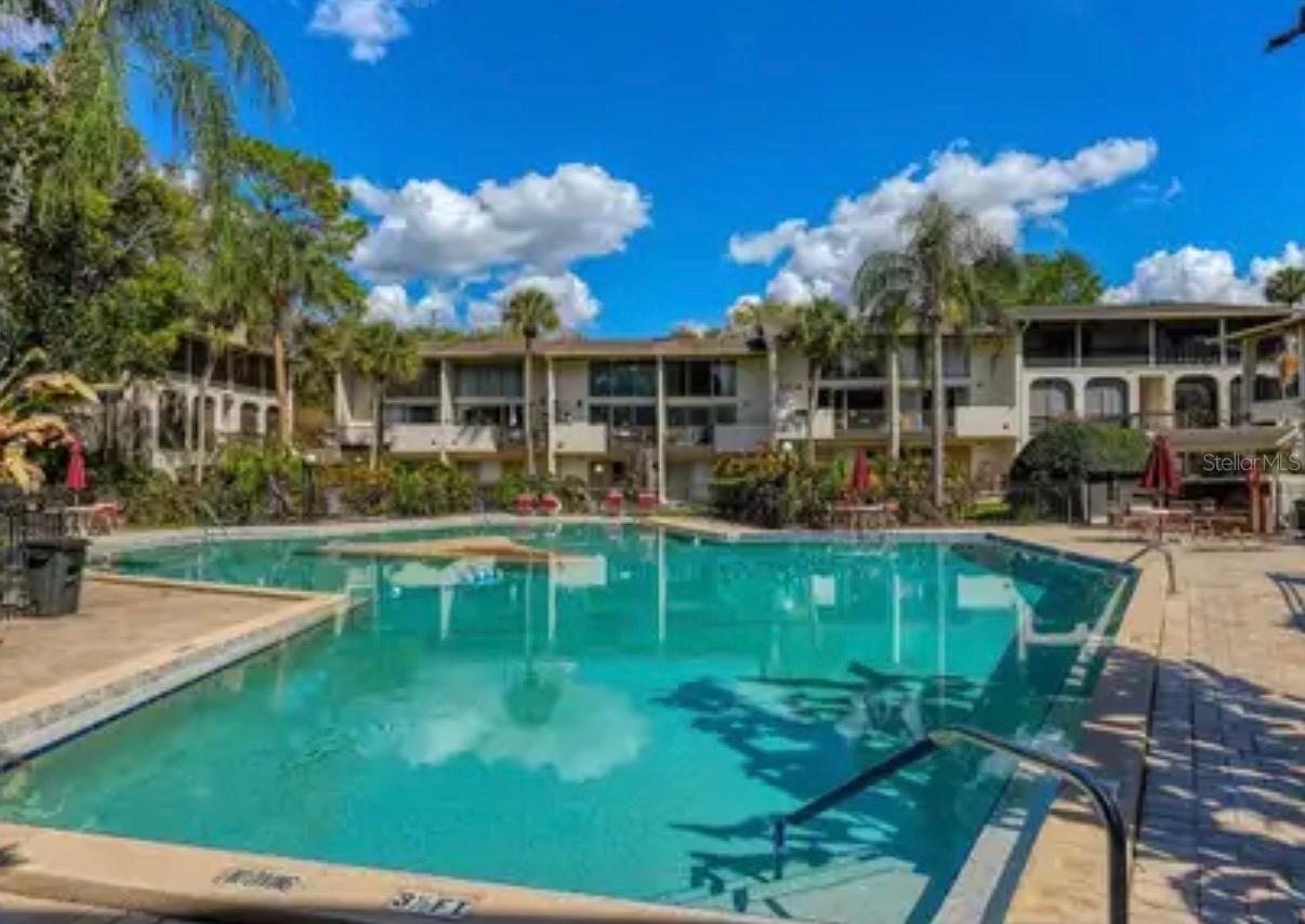 LOCATION, LOCATION, LOCATION - Welcome to Capistrano Condominium! A waterfront community offering resort-style living in the heart of Altamonte Springs. This is a quiet unique LOFT STYLE 964sqf apartment. Definitely much more than you would expect for 1-bedroom, 1-bathroom condo unit. Step inside this light-filled open space with soaring wood vaulted ceilings creating an inviting atmosphere. The floor plan includes a spacious living area, and a bright, functional kitchen designed for everyday living. The generously sized bedroom offers a walk-in closet and ensuite bathroom. Step outside onto the wide balcony and enjoy luscious tropical landscaping surrounding the pool view.
Resident will also enjoy access to the surrounding Chain of Lakes and its natural preserve and boat docking opportunities. LAKE ORIENTA
Your numbered parking space Is exactly next to your front door. Other amenities include tennis courts, 2 swimming pools. fitness center and a clubhouse. Centrally located near Altamonte Mall, shopping, dining, and entertainment and easy access to I-4. Whether you're seeking a primary residence or a seasonal retreat opportunity, this condominium offers an exceptional combination of location, amenities, and lifestyle.
