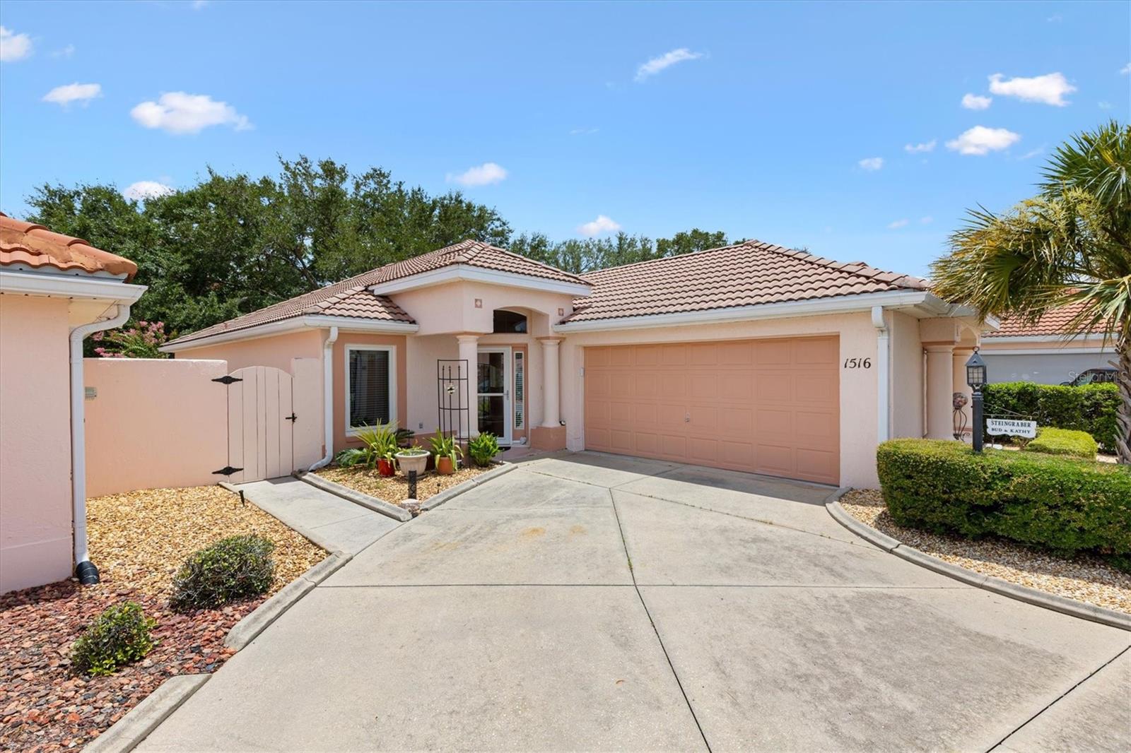 STUCCO COURTYARD VILL ON GOLF COURSE 2-bed 2-bath with a versatile Den/Florida Room located in Villa De Laguna West in the Village of Rio Grande— On Los Lagos Golf Course, 1 mile to Spanish Springs Town center, shopping and dining on US 441 and 2.5 miles to Lake Sumter Landing. Constructed with durable block stucco and topped with a classic barrel tile roof, this home is perfectly positioned on the golf course with NO BOND! HVAC 2015, Hot Water Heater 2022. New Renewal windows by Anderson. Inside, you'll find luxury vinyl plank flooring throughout, ceiling fans in every room, and an inviting entry foyer with a hall coat closet. The eat-in kitchen features granite countertops, a stainless steel dual-basin sink, pantry closet, and plenty of workspace for everyday living and entertaining.
The spacious primary suite includes a large walk-in closet and an ensuite bath with dual vanities, a step-in shower. Guests will appreciate the private access from the guest bedroom to the guest bath, creating a comfortable retreat for family and visitors.
The Den/Florida room has French doors with inset blinds seamlessly connecting to the birdcage, enhancing your outdoor living experience. The large open courtyard provides the perfect setting for relaxing, entertaining, or enjoying the golf course views. Additional features include a storm front door, Bose surround sound radio system, 2-car garage with convenient access to the private courtyard
This exceptional villa combines privacy, outdoor living, and golf course views in one desirable package. Be sure to watch our video and schedule an appointment to see it today! Start living the Villages dream.