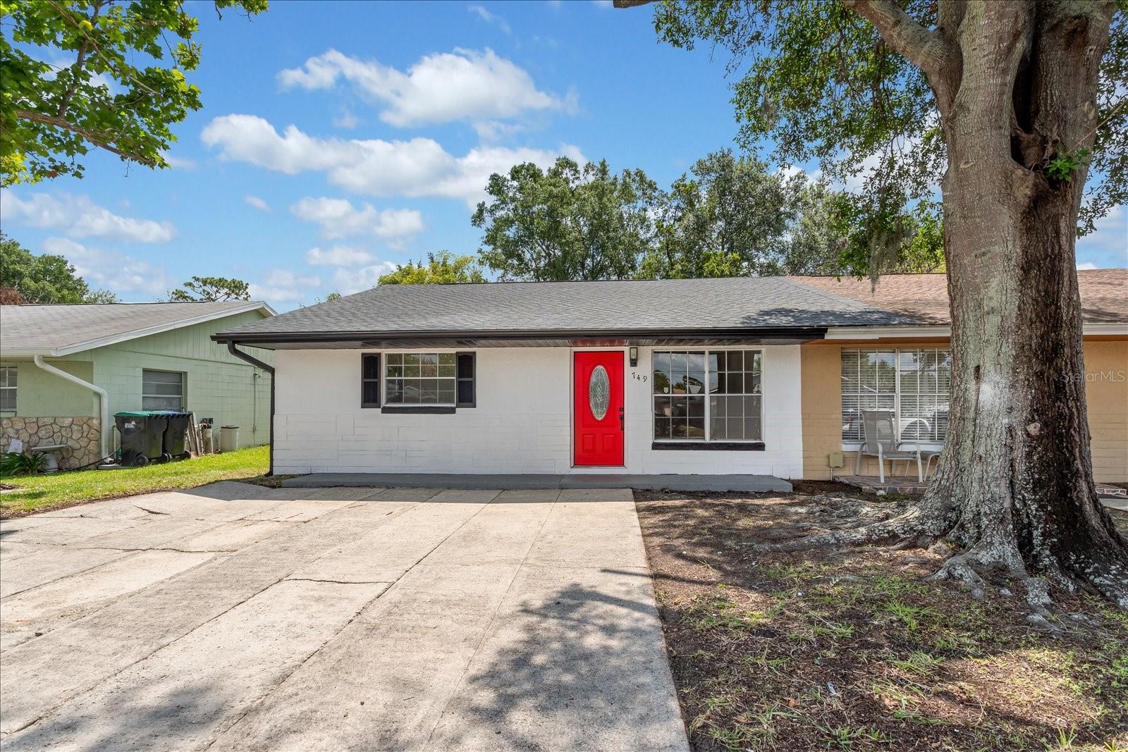 Welcome home to this NEWLY remodeled half-duplex, a wonderful opportunity to live near the Rio Pinar Golf Course, right in the heart of Orlando! This gem features a BRAND NEW ROOF, a Brand New Water Heater, a newer A/C system (approximately 4 years old), updated electrical panel (approximately 3 years old), and updated plumbing, all New LVP Flooring and Modern Baseboards throughout the home, all New interior Doors and sleek door handles, Freshly painted interior and exterior, a Complete Kitchen Remodel includes modern Shaker Cabinetry, Quartz countertops, Stainless Steel Appliances, and a designer tile backsplash for high-end finish. This home showcasing an elegant Acoustic Wood Wall Panels for a sleek interior design with modern light fixture, recessed lighting with built-in nightlights, ceiling fans in living room and each bedroom with remote controls. Both bathrooms have been FULLY REMODELED with high-end finishes that will provide a luxurious environment for the start and end of your day. 

This Cozy half-duplex feature 2 bedrooms with walk-in closets, 2 bath, inside laundry room, Covered Porch and a spacious fenced in back yard perfect for relaxing, entertaining, or pets! Located in a wonderful neighborhood with NO HOA, across from Publix shopping plaza, restaurants, banks, hospital, close to Waterford Lakes Mall, UCF, Valencia Community College, less than 1mile access to 408 and 417 Expressways. 15 minutes to Orlando International Airport (MCO). Schedule your showing today, don't miss this opportunity to make this home your own!
