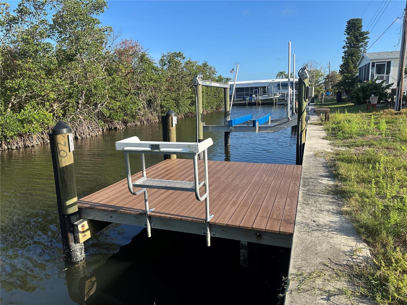 DON’T MISS THIS WATERFRONT GEM!
A rare opportunity to own a prime OVERSIZED WATERFRONT LOT in the sought-after Tropic Isles, a 55+ RESIDENT-OWNED WATERFRONT community! With 60 feet of SEAWALL and DIRECT CANAL ACCESS this property is a boater’s paradise. A BRAND-NEW 10x10 DOCK and 10,000 lb BOAT LIFT make getting on the water effortless—whether you're fishing, cruising, or simply soaking up the Florida sun.
Tropic Isles offers friendly environment, great amenities and a calendar full of activities to enjoy.   Opportunities like this don’t show up everyday —secure your slice of paradise before it’s gone!