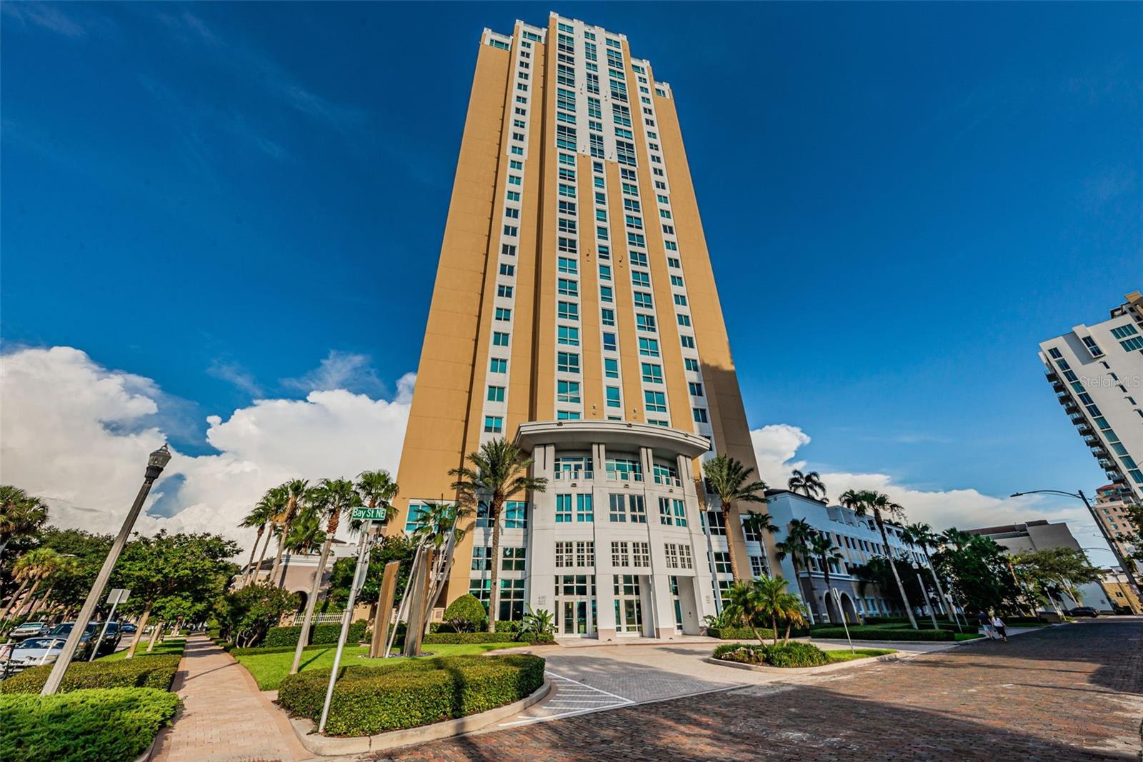 Enjoy soaring views on the 25th floor of 400 BEACH CONDOS! This residence is extra special because there are only two condos that share this level!  Built in 2007, 400 Beach continues to enjoy impeccable maintenance and superior service from their long-time property manager and twenty-four-hour concierge team! With almost 4000 square feet of living space, there is plenty of space to spread out! There are three bedrooms with ensuite bathrooms plus a powder room for day guests. There is a dedicated home office with floor to ceiling windows capturing beautiful views that can also be used as a bedroom with a closet. At 400 Beach Condos, each residence has their own private foyer and double door entrance going into the Grand Salon. There is also a separate Den/Media room that could serve as a second office. A large formal Dining area and comfy Family Room is situated directly off the updated gourmet Kitchen complete with induction cooktop (gas available), granite counters, custom cabinets with tons of storage AND even a spacious Butler's Pantry! There are two private terraces which are perfect for outdoor entertaining or Al Fresco dining.  Interior features include floor to ceiling windows in the main living areas, marble flooring in the front entry and hallway, beautiful hardwood floors in the main living areas, the Kitchen, and all bedrooms. The spacious owner’s suite offers access to one of the two terraces with magnificent water views, two separate walk-in closets, an updated luxurious bath with separate shower, a jetted tub, two separate vanities and sinks, plus a separate water-closet. Updates completed over the past 6 years include: replacement of 3 Carrier HVAC systems, new granite countertops in Kitchen, Laundry and all Bathrooms; new hardwood flooring in Kitchen to match flooring throughout the home, a Bosch Dishwasher, a GE Washer and Miele Dryer, a 75 gallon hot water heater, Sub Zero under-counter Wine and Beverage refrigerators were added in Kitchen, In-wall speakers were installed in Family Room, Kitchen, Living Room, Dining Room, Office and Owners Bathroom; motorized Lutron shades and Lutron lighting controls throughout most rooms, window tint on all windows, closet systems added to walk-in closets, plus electric car connections were added to both assigned parking spaces. Wonderful amenities include 24-hour concierge/security, on-site building manager, world class fitness center, resort style pool/spa, grilling stations, two social rooms, a catering kitchen, separate storage area and 2 secured parking spaces. Enjoy all this lifestyle has to offer with outdoor cafes, fabulous restaurants, museums, art galleries, waterfront parks, shopping, and so much more only steps away from your front door! Schedule your private showing today!