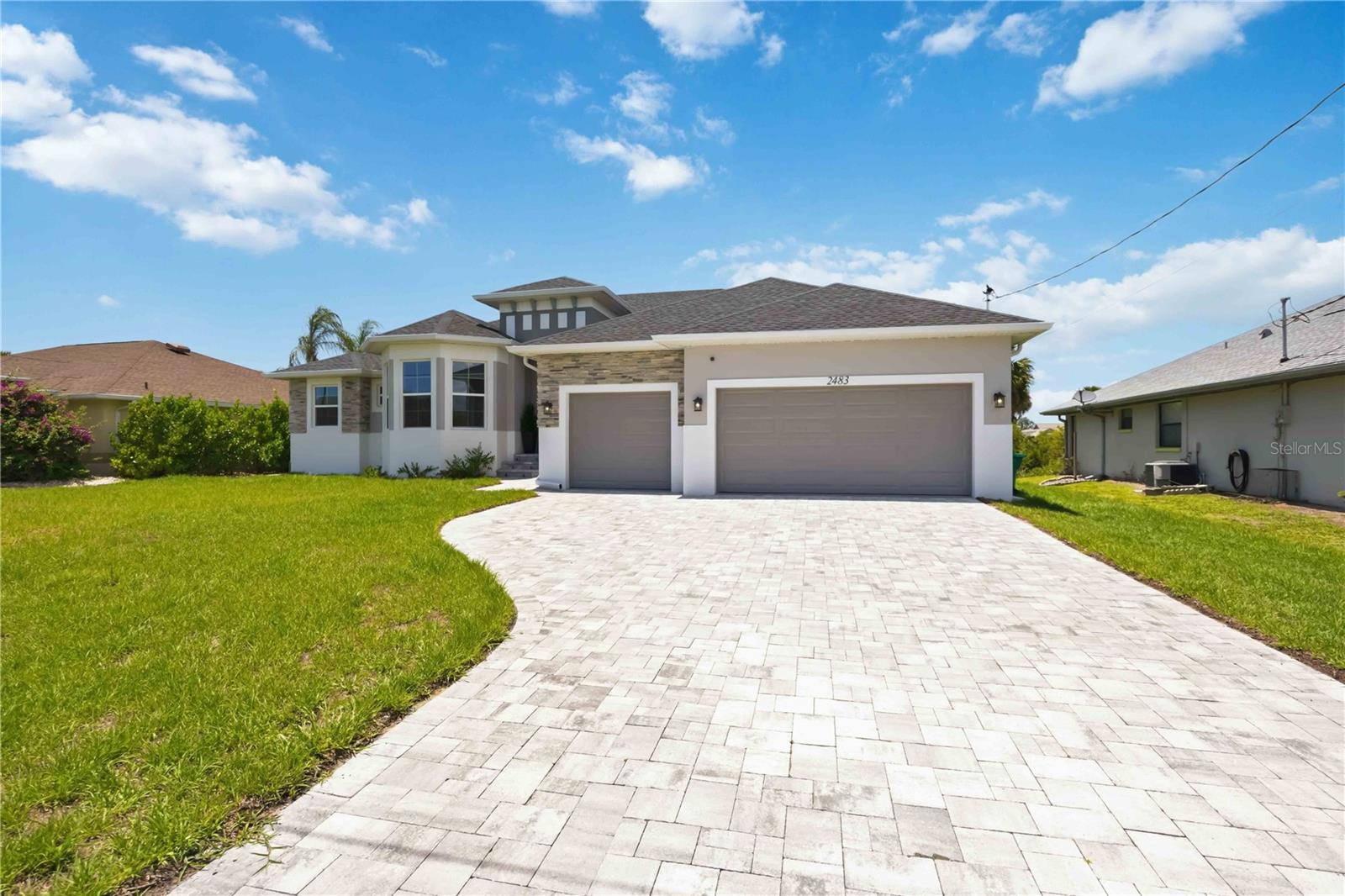One or more photo(s) has been virtually staged. HOT!!! REDUCED $20K. WELCOME TO THIS STUNNING BRAND-NEW WATERFRONT LUXURY RESIDENCE — completed at the end of December 2025, featuring a BRAND-NEW PRIVATE DOCK AND BOAT LIFT finished at the end of May 2026, and NEVER OCCUPIED!

Thoughtfully designed with high-end upgrades, modern coastal elegance, and exceptional attention to detail. Elevated above the base flood elevation, this home was built to help reduce the risk of floodwaters reaching living spaces and minimize potential damage.

Located in one of Southwest Florida's premier boating communities, this exceptional property offers direct NO-BRIDGE boating access to the Gulf and is just minutes from ENGLEWOOD BEACH! Enjoy the ultimate Florida boating lifestyle right from your backyard.

"REMAINING TRANSFERABLE BUILDER WARRANTIES" FOR BOTH THE HOME AND THE POOL are included and will transfer to the new owner, providing added peace of mind.

This home showcases true MODEL-HOME QUALITY throughout. Situated on waterfront lot with a LARGE SEAWALL, and perfect for your boat, jet skis, and all your water toys.

Inside, you'll find a breathtaking OPEN-CONCEPT FLOOR PLAN with SOARING CEILINGS, expansive living spaces, and abundant natural light. The designer kitchen is a showstopper, featuring HIGH-END QUARTZ COUNTERTOPS, custom cabinetry, premium finishes, and a MASSIVE UPGRADED ISLAND — perfect for entertaining family and guests.

IMPACT-RATED SLIDING GLASS DOORS and STORM-IMPACT WINDOWS, fill the home with natural light while providing a low home insurance, enhanced safety, energy efficiency, and seamless indoor-outdoor living. Built to modern county codes and elevated above the required flood elevation.

Step outside to your PRIVATE RESORT-STYLE OASIS featuring a SPARKLING POOL, HOT SPA, OUTDOOR KITCHEN, OUTDOOR WINE REFRIGERATOR, spacious covered lanai, and spectacular waterfront views. The perfect setting for relaxing, entertaining, and enjoying breathtaking Florida sunsets while embracing the ultimate waterfront lifestyle year-round.

This is more than a home — IT'S A LUXURY WATERFRONT LIFESTYLE. Bring your boat and start living the dream today!

SCHEDULE YOUR PRIVATE SHOWING TODAY!