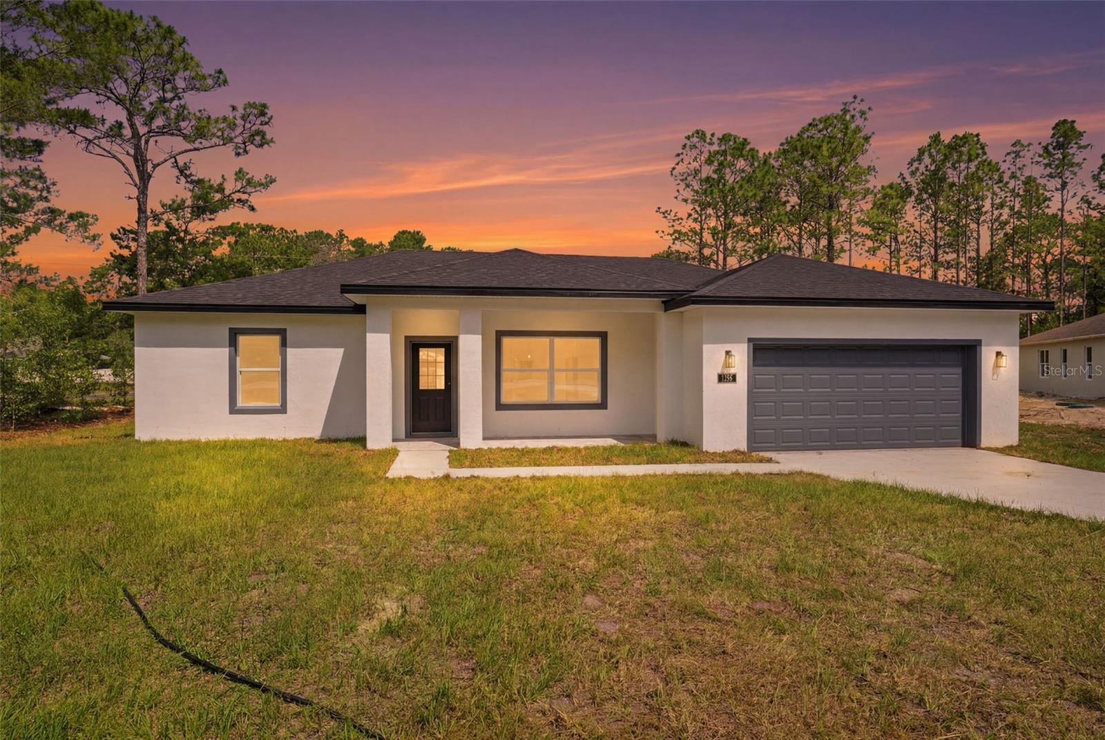 Discover this brand-new construction home featuring 3 bedrooms, 2 bathrooms, and a modern design in the desirable Citrus Springs area. Move-in ready and thoughtfully crafted for today's lifestyle, this beautiful residence offers an open-concept floor plan that seamlessly blends comfort, functionality, and contemporary style.

The spacious primary suite provides a large walk-in closet, while two additional bedrooms feature built-in closets for added storage and organization. The bright living and dining areas flow effortlessly into a stunning kitchen equipped with solid wood cabinetry, elegant quartz countertops, premium appliances, and ample workspace—perfect for everyday living and entertaining.

Every detail has been carefully selected to create a home that is both stylish and practical. Conveniently located near major roadways, including US-41 and FL-44, residents enjoy easy access to surrounding cities and destinations throughout Central Florida.

Nearby conveniences include Publix Super Market, CVS Pharmacy, Walgreens, local restaurants, shopping centers, medical facilities, and recreational amenities. Outdoor enthusiasts will appreciate close proximity to the scenic Withlacoochee State Trail, Rainbow Springs State Park, and the crystal-clear Rainbow River, offering endless opportunities for hiking, biking, kayaking, and nature exploration. Local schools, parks, and community services further enhance the appeal of this growing Citrus Springs neighborhood.

A wonderful opportunity to enjoy modern living, everyday convenience, and access to some of Florida’s most beautiful natural attractions.