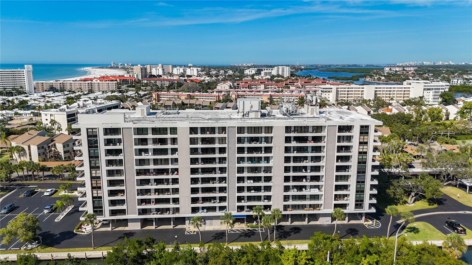 Welcome to one of the best locations on Siesta Key. The Anchorage is located on the corner of Stickney Point and Midnight Pass. It’s all about convenience and living the good life. Location is fantastic! Wait until you see the grounds! You have the best of both worlds. Your new condominium is a 2 bedroom 2 bathroom split plan with brand-new hurricane sliding doors.  Inside you have abundant natural light and a spacious combo kitchen/dining room/living room setting offering a move-in-ready condition. What truly sets The Anchorage apart is its canal-front dockage with first-come, first-serve boat slips, providing direct access to Sarasota Bay and the Intracoastal Waterway. For boating enthusiasts, this is an exceptional value, $10.00 per month boat slip fee.  This is crazy insane ridiculous pricing for a boat slip…offering a rare opportunity to enjoy waterfront living and boating convenience without the premium price or waitlists typically found on Siesta Key. The building is solid concrete!  This is a perfect investment for rental opportunities. Weekly rentals are allowed. The building and grounds are in wonderful shape! The Anchorage has so many amenities to offer owners and renters, including an Olympic-size heated swimming pool, Fitness Center, Lighted Pickleball & Tennis Courts, Clubhouse, BBQ & Picnic Areas and Kayak Storage. If you have a boat, The Anchorage also offers free dockage along the Seawall! There is a trolly that you could take to Siesta Key Village to enjoy more shopping, entertainment and dining options. Your new condo has its own carport. The Anchorage is very conveniently located near Stickney Point Bridge to give you easy access to the mainland, including downtown Sarasota!