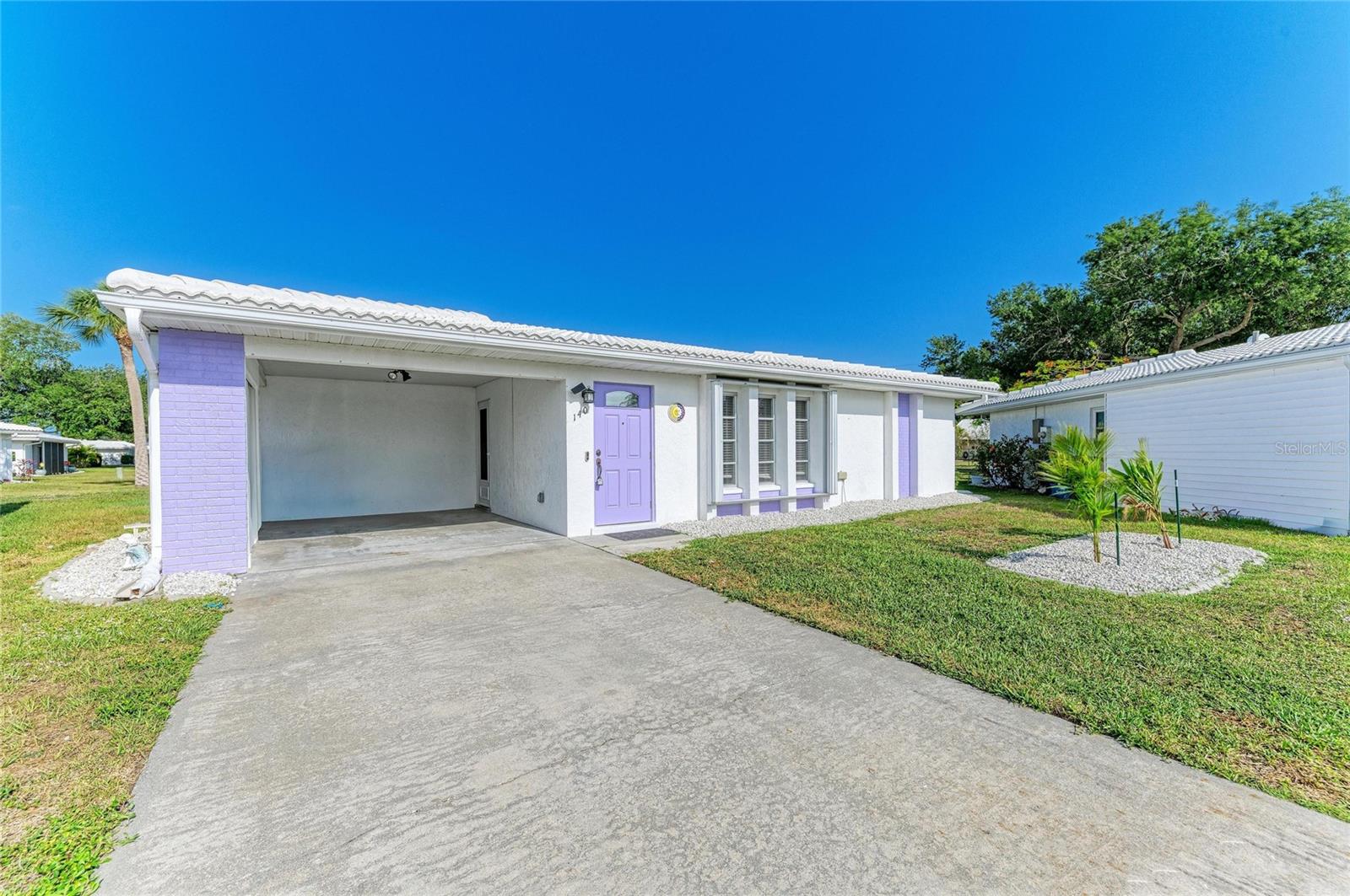 Discover relaxed, maintenance-free Florida living in the welcoming Circle Woods all-ages community of Venice. This move-in ready, freshly painted, NO CARPET condo features durable vinyl floors throughout, an updated kitchen with quartz countertops and new appliances, convenient interior laundry, window blinds, hurricane shutters, and a screened Florida room with sliding glass doors—perfect for morning coffee or sunset breezes. A NEW ROOF adds peace of mind for years to come. Circle Woods is a maintenance-free community ideal for snowbirds and full-time residents, located just minutes from Manasota Key and Venice beaches, shopping, dining, and the Atlanta Braves spring training facility. The monthly condo fee includes lawn care, access to two heated community pools, a spa, sauna, fitness room, clubhouse, library, game room and more. Social life here is vibrant with Pub Nights featuring live music and food trucks, game nights, fitness groups and more—offering a true vacation-style lifestyle with the convenience of maintenance-free homeownership.