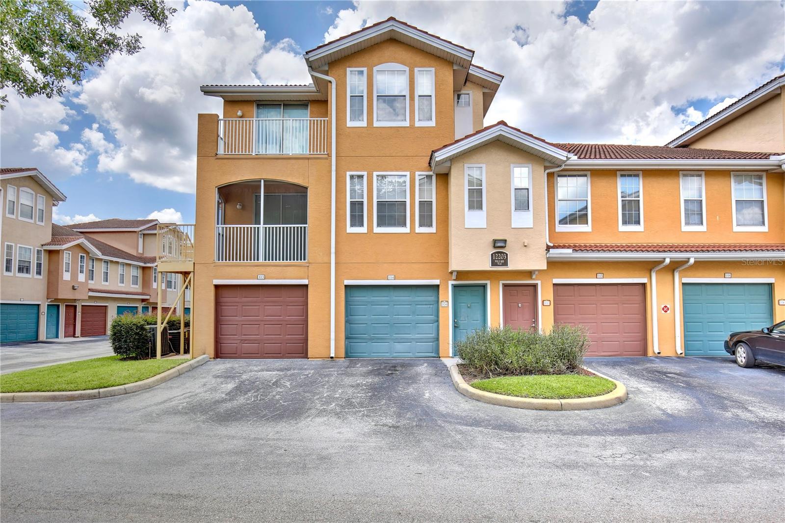 Welcome to this spacious three-story townhome offering comfort, convenience, and a desirable gated community lifestyle. This vacant, move-in ready residence features 2 bedrooms, 2.5 bathrooms, and an attached 1-car garage. The thoughtfully designed floor plan includes comfortable living spaces with carpet throughout the living areas and bedrooms and tile flooring in the kitchen. The kitchen comes fully equipped with all appliances included, and the washer and dryer convey, making your move even easier. Enjoy outdoor living from two private balconies, one of which is screened-in, providing the perfect space to relax year-round. Residents of this gated community have access to outstanding amenities, including a community pool and fitness center. Ideally located near shopping, dining, and schools, with easy access to major roadways, this home offers both everyday convenience and an excellent location for commuting throughout the Orlando area.
