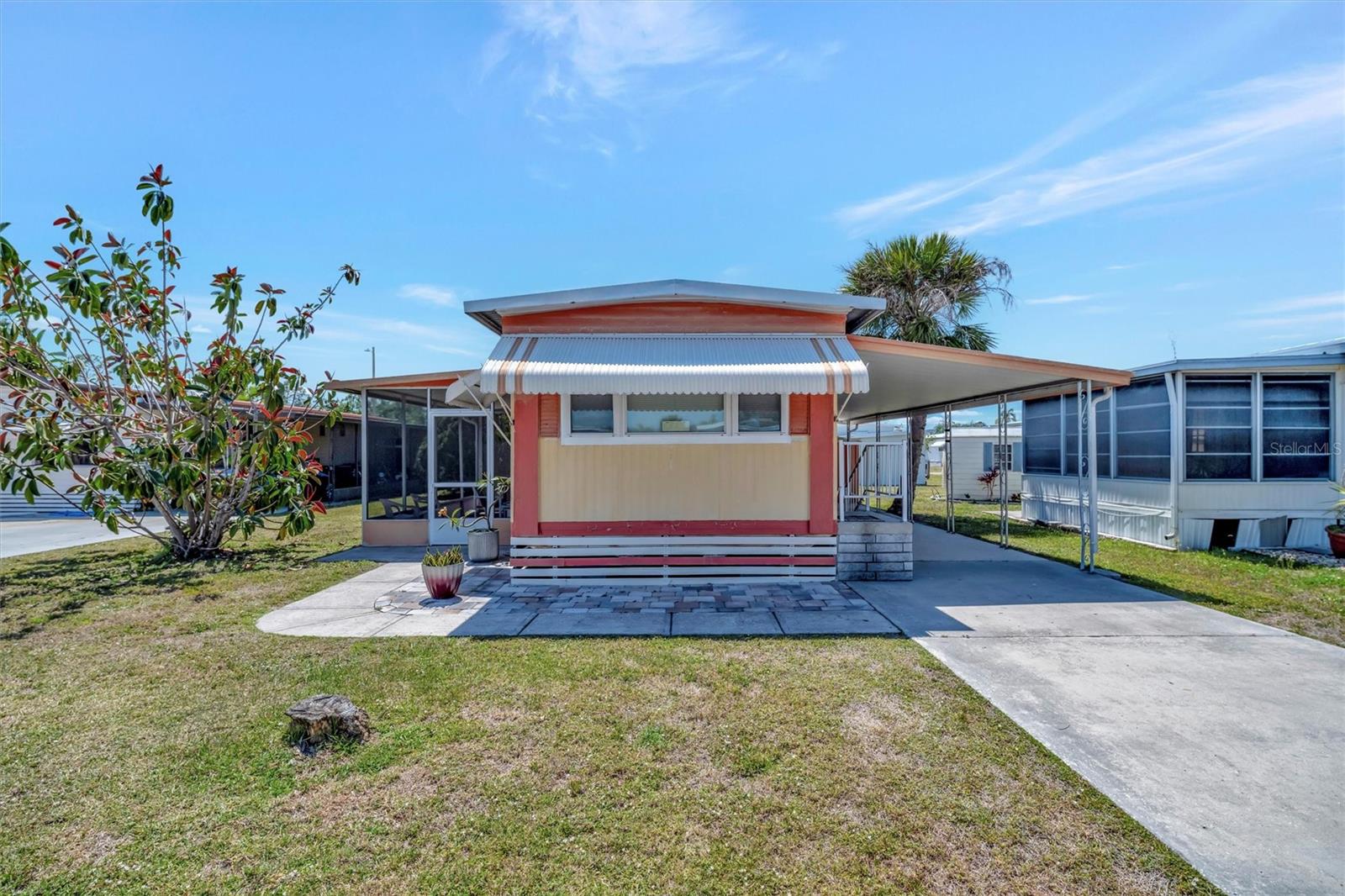 Welcome to Caribbean Isles, A Waterfront, Gated Cooperative in the Heart of Apollo Beach, Florida!
Step into coastal living with this upgraded 2-bedroom, 1-bath home, nestled in one of the area's most sought-after 55+ waterfront communities. This charming residence features new flooring and windows, filling the space with abundant natural light and creating a welcoming ambiance. The open floor plan enhances the sense of space and makes everyday living and feel effortless and comfortable.

Love the outdoors? You’ll feel right at home here. Caribbean Isles offers private kayak and boat launch facilities with direct access to Tampa Bay via our scenic canal system, perfect for a day on the water. Stay active with bocce ball, shuffleboard, and horseshoes, or relax in the year-round heated pool. The clubhouse is a hub of activity, featuring a craft room, game room with pool tables, card tables, bar shuffleboard, and darts, ideal for both casual fun and social connection. Our calendar of events keeps things lively with themed dinners, dances, and other community activities that make it easy to meet neighbors and create lasting friendships.
Located between Tampa and Sarasota/Bradenton, Caribbean Isles offers convenient access to beaches, shopping, dining, and amusement parks, all just a short drive away.

Come visit and see why so many love calling Caribbean Isles home. This is more than a house, it's a lifestyle.