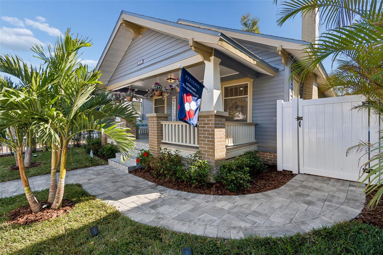 Beautifully Remodeled craftsman-style Bungalow in Historic Old Northeast!

The epitome of St. Pete living, blending vintage soul with modern convenience, this TURN-KEY, thoughtfully renovated Craftsman-style bungalow sits on a classic, brick-paved street in the highly sought-after Historic Old Northeast neighborhood of St Petersburg. This home has been updated for modern living while preserving the timeless architectural character that makes this district so iconic.  



As you step up to the classic covered front porch, you are greeted by an abundance of natural light as you step into a beautiful living room, complete with fireplace, and dining area beyond.

Beautifully preserved hardwood floors throughout the living spaces and the 2 bedrooms complement the original built-ins matching warmth with historic charm.  The bathroom has been elegantly updated with the right touch of historic class and is striking in its own right, while the washer and dryer in the hallway closet add modern ease as do the generous bedrooms ideally situated on each end of the hallway for separation. The contemporary kitchen features stainless steel appliances, white-granite countertops, and a counter-height peninsula equally perfect for casual meals or conversing while cooking, as well as a built-in wine refrigerator. The kitchen opens up onto a bright and airy Florida-room style living area that truly brings the lush, verdant outdoors in.



The fully fenced backyard features tropical landscaping, solar lighting and a large deck perfect for relaxing or entertaining  — the ideal setup for thriving in Florida's year-round indoor-outdoor lifestyle.   Pavers are appropriately placed as walkways throughout the gorgeous landscaping.  The garage features an additional set of side-by-side washer and dryer and has a refinished interior to match the house.  Additional parking is provided by a paver-stoned parking pad just outside the fence.



Living in Historic Old Northeast means embracing a vibrant, walkable lifestyle. You are just a short stroll away from the scenic waterfront trails of North Shore Park, Vinoy Park, and Coffee Pot Bayou. Leave the car at home and walk or bike to the world-class dining, boutique shopping, and vibrant arts scene of downtown St. Petersburg.

With its lush canopy of mature oak trees, brick streets, excellent proximity to the bay, and just a short drive to our incredible beaches, this is more than just a home - it's a turn-key lifestyle. 

Don't miss your chance to own a piece of St. Pete charm -  schedule your private tour today!