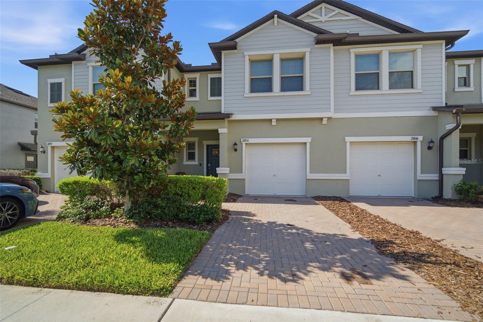 Why wait for new construction when this move-in-ready townhome already includes the upgrades buyers want most?! This beautifully maintained 3-bedroom, 2.5-bathroom home features crown molding throughout, a specious kitchen, upgraded appliances, a private patio, and a sealed paver driveway. The HOA also includes water, adding even more value!

Ideally located within the community, this townhome is just a short walk to the elementary school and perfectly situated between two amenity centers, including the brand new clubhouse. Fresh interior paint and meticulous upkeep reflect true pride of ownership, making this home completely move-in ready.

Complete with a one-car garage, this townhome offers an exceptional combination of comfort, style, and convenience in one of the community's most desirable locations. Come see today!