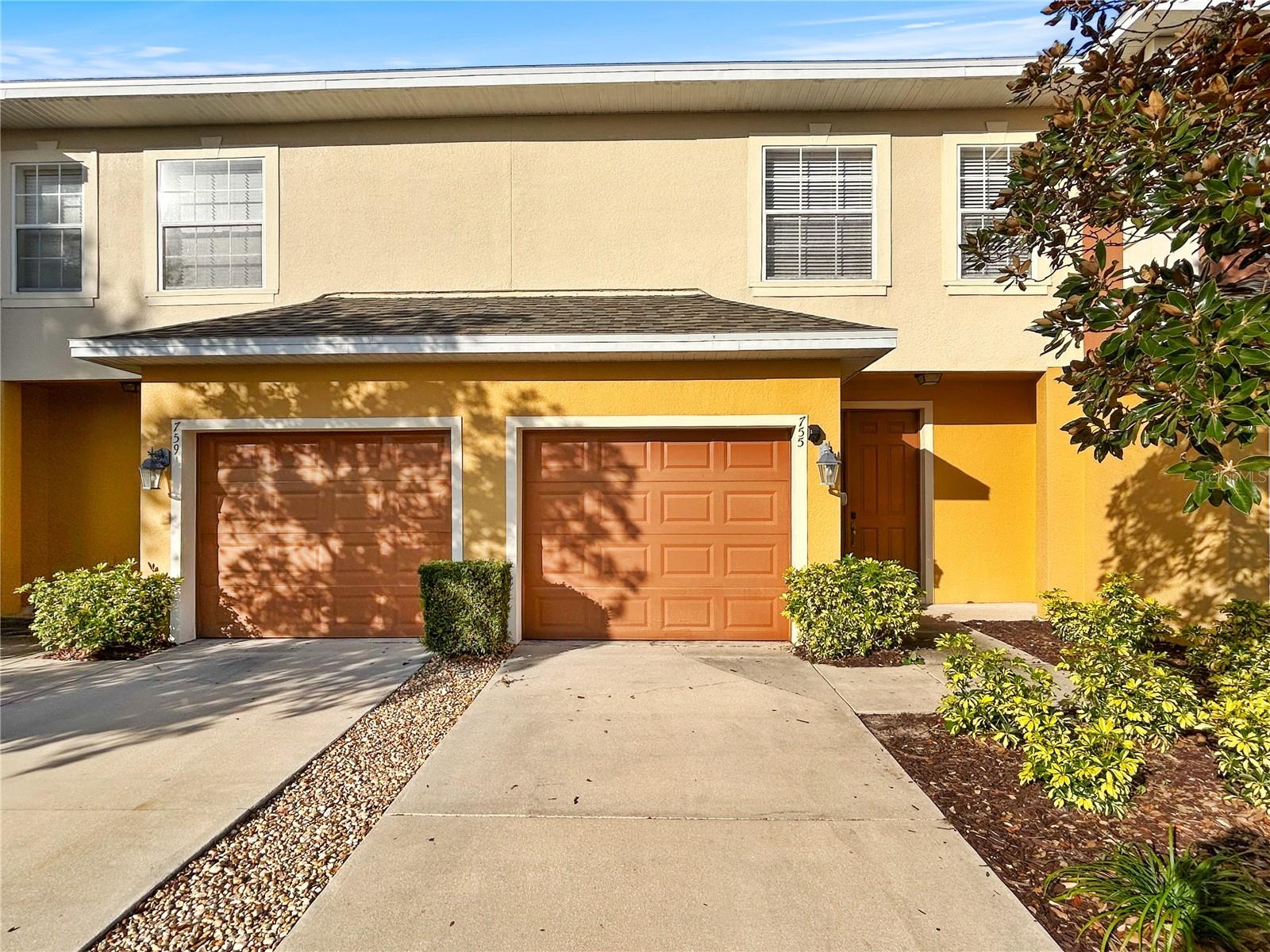 Conveniently located in a desirable Ocoee neighborhood, this low-maintenance townhome features a practical two-bedroom, two-and-a-half-bathroom layout perfect for easy living. Positioned near the front of the community, the property offers unbeatable proximity to the neighborhood mailboxes and the community pool, making daily errands and relaxation just a short walk from your front door. The main level offers an open living space alongside a convenient half-bath for guests, while the upper level provides privacy for the bedrooms. An attached garage adds functional storage and parking. While the home presents an excellent opportunity to buy into a great area, it is being sold as-is and awaits its next owner's personal touches. This is a straightforward choice for anyone prioritizing an ideal neighborhood location, proximity to the major roadways, and access to fantastic community amenities.