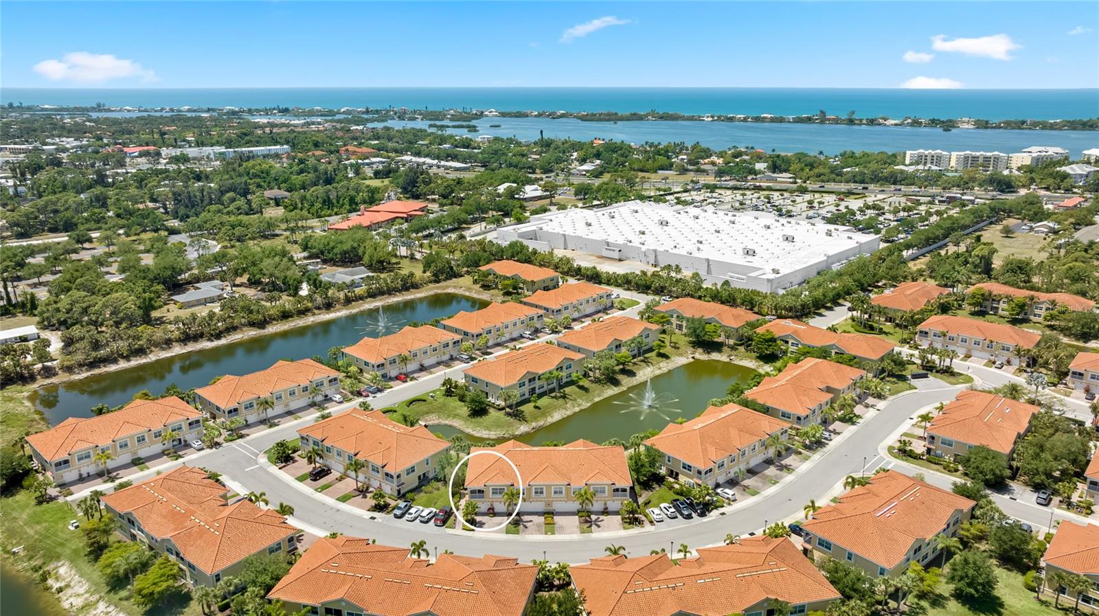 One or more photo(s) has been virtually staged. Live where everyday life feels simple, connected, and close to everything you love. Located in the gated community of Bay Street Village in Osprey, this beautifully maintained second-floor condo offers the perfect blend of comfort, convenience, and a relaxed Florida lifestyle. Just minutes from Nokomis Beach, Siesta Key, the Legacy Trail, Oscar Scherer State Park, and an abundance of shopping and dining options, everything you need is right at your fingertips. This 2-bedroom, 2-bathroom condo welcomes you with a private entry and interior stairway leading to a bright and open main living space. Positioned on the second floor, the home enjoys added privacy along with elevated views and an abundance of natural light. The layout lives effortlessly, with high ceilings and neutral finishes creating an inviting and airy feel throughout. An attached garage with direct interior access adds everyday ease and practicality. The kitchen is both functional and stylish, featuring granite countertops, stainless steel appliances, a large island with seating, and a walk-in pantry. It opens seamlessly to the dining and living areas, making it easy to host, relax, or simply enjoy day-to-day living without feeling closed off. The spacious primary suite offers a comfortable retreat with a large walk-in closet and an en-suite bathroom complete with dual sinks and a walk-in shower. A second bedroom and full bath provide flexibility for guests, a home office, or additional living space. Enjoy your morning coffee or unwind in the evening on the screened lanai, where you can take in the Florida breeze and peaceful surroundings from your elevated position. Whether you're heading out to the beach, meeting friends for dinner, or enjoying the nearby parks and trails, this location makes it all feel effortless. Bay Street Village enhances the lifestyle even further with resort-style amenities including a community pool, fitness center, scenic ponds, and beautifully landscaped grounds, all within a gated and well-maintained setting. **SELLER FINANCING AVAILABLE** **THIS PROPERTY QUALIFIES FOR A 1% LENDER INCENTIVE IF USING PREFERRED LENDER. INQUIRE FOR MORE DETAILS.**