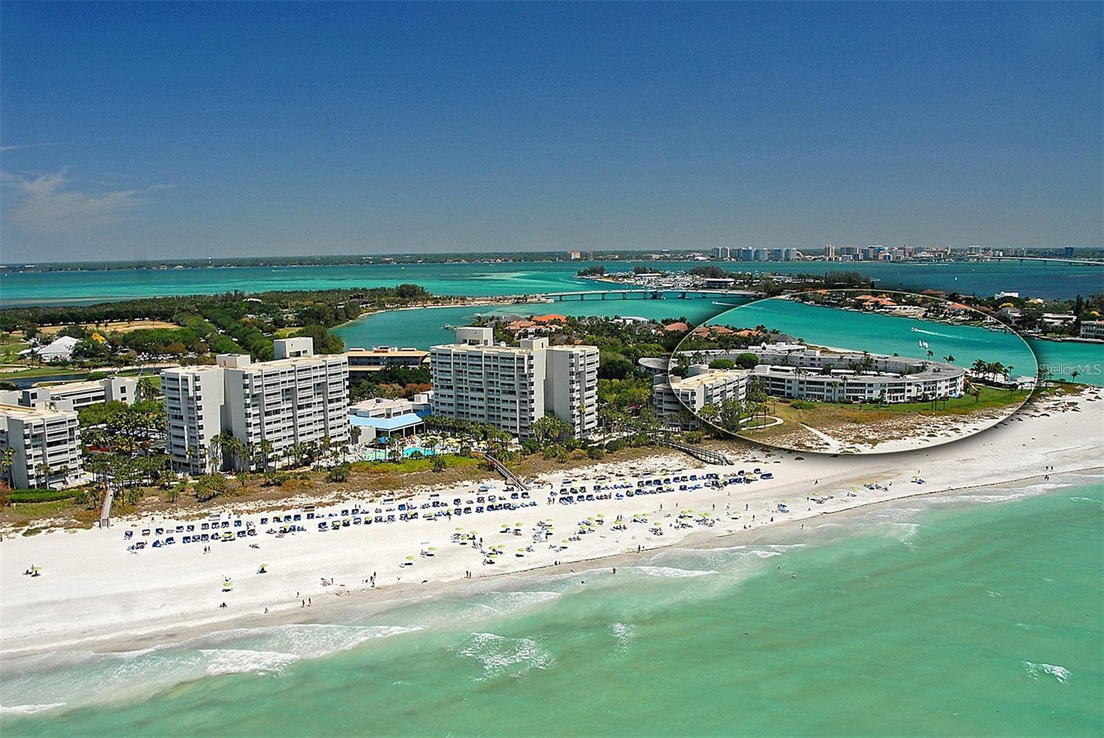 Sands Point, a sought-after beachfront community within the gates of the Longboat Key Club, set on the gorgeous southern tip of Longboat Key. This newly remodeled 3BR/2BA, split plane with a large open living space to relax or entertain family and friends. The kitchen has been remarkably redone, featuring a breakfast bar, dining area, and custom solid surface countertops to complement the all-white cabinetry, designer tile and backsplash and stainless-steel appliances. The Master suite provides a wall of windows to enjoy morning sunlight and views, this spacious ensuite w/bath and walk-in shower.  The 2& 3rd guest bedroom is well-sized and arranged to ensure the comfort of your visitors,  with a beautiful tropical backdrop beyond. Residents of Sands Point indulge in a resort lifestyle, with a heated pool, Kayaking, clubhouse and optional boat docks at the Sands Point Marina. Shorts drive to the restaurants and shops of St. Armands Circle as well as downtown Sarasota.