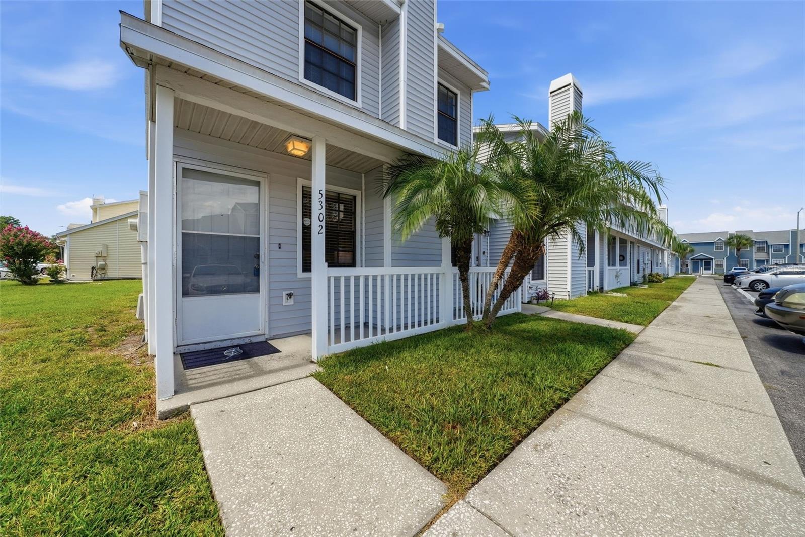 Interior photos coming Wednesday 6/24..You don't want to miss the inside of this cute townhome!! Welcome home to this spacious 3-bedroom, 2.5-bath townhome in the desirable Hampton Park community, where peaceful pond views and low-maintenance living come together. This home features tile and NEW vinyl flooring throughout the first floor, with carpet upstairs for added comfort.

The inviting open-concept layout offers a spacious living and dining area centered around a cozy wood-burning fireplace, making it perfect for both everyday living and entertaining. The kitchen provides ample cabinet and counter space, all appliances, a closet pantry, and a convenient utility/storage closet with washer and dryer included.

Step outside through the sliding glass doors to the screened porch overlooking the tranquil pond—the perfect spot to enjoy your morning coffee or unwind at the end of the day. 

Upstairs, the split-bedroom floor plan offers privacy for everyone. The primary suite features dual closets, a private vanity area, and an en-suite bath, while two additional bedrooms provide flexibility for guests, family, or a home office.

The low HOA fee  includes exterior maintenance, including the roof, two assigned parking spaces, plenty of guest parking, and access to the large heated community pool. Hampton Park is conveniently located directly across from a public park featuring a playground, basketball courts, and tennis courts.

Ideally situated near shopping, dining, entertainment, and major highways, you'll be just 5 minutes from Publix and Walmart, 20 minutes from USF and Tampa International Airport, 13 minutes from Rocky Point Golf Course, 30 minutes from Downtown Tampa, and approximately 45 minutes from Clearwater Beach.

Offering comfort, convenience, and beautiful water views, this townhome is ready for its next owner. Schedule your private showing today!